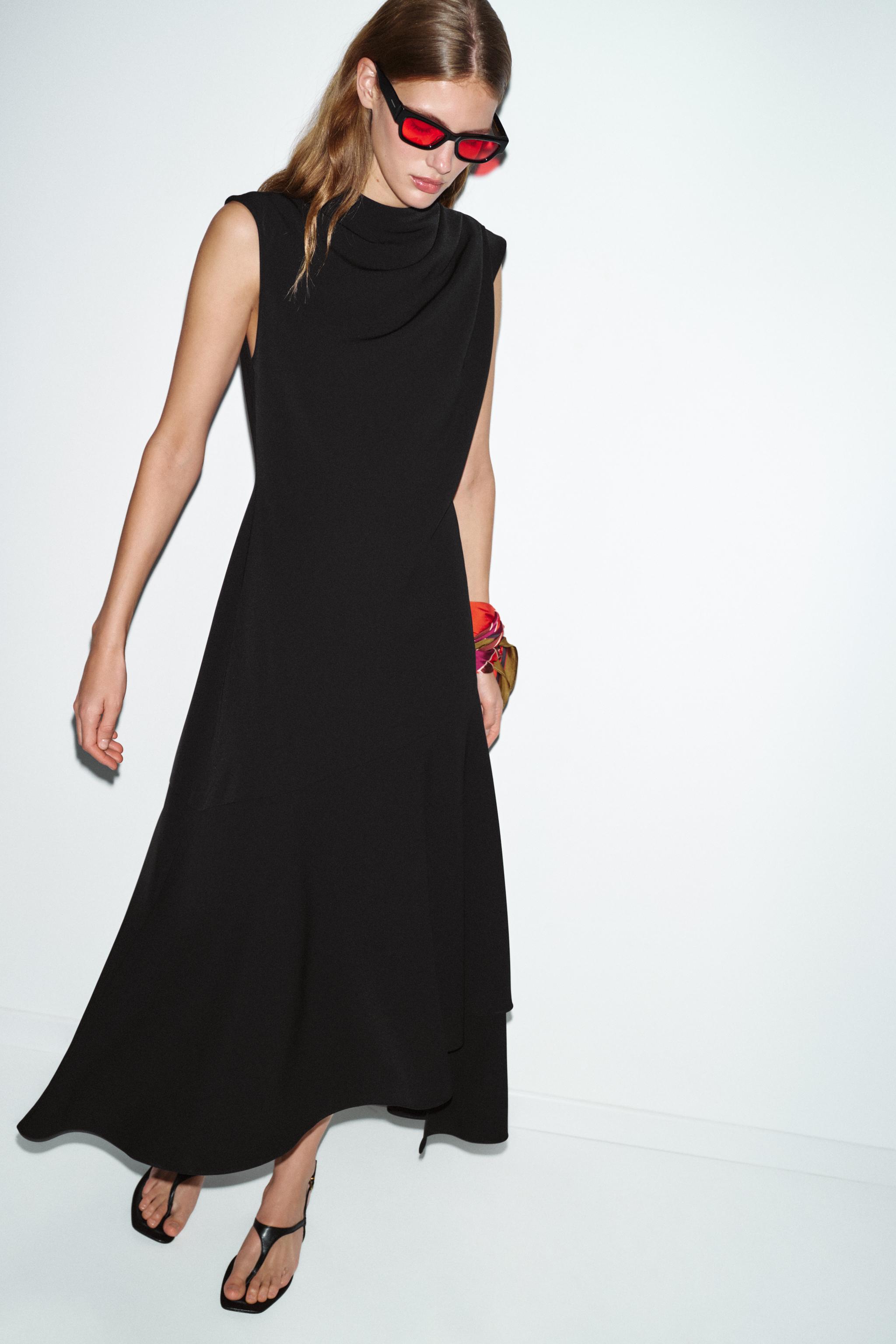 ROBE MI-LONGUE ASYMÉTRIQUE