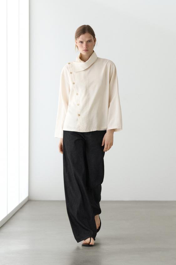 Flowing shirt with asymmetric buttons from Zara - $130