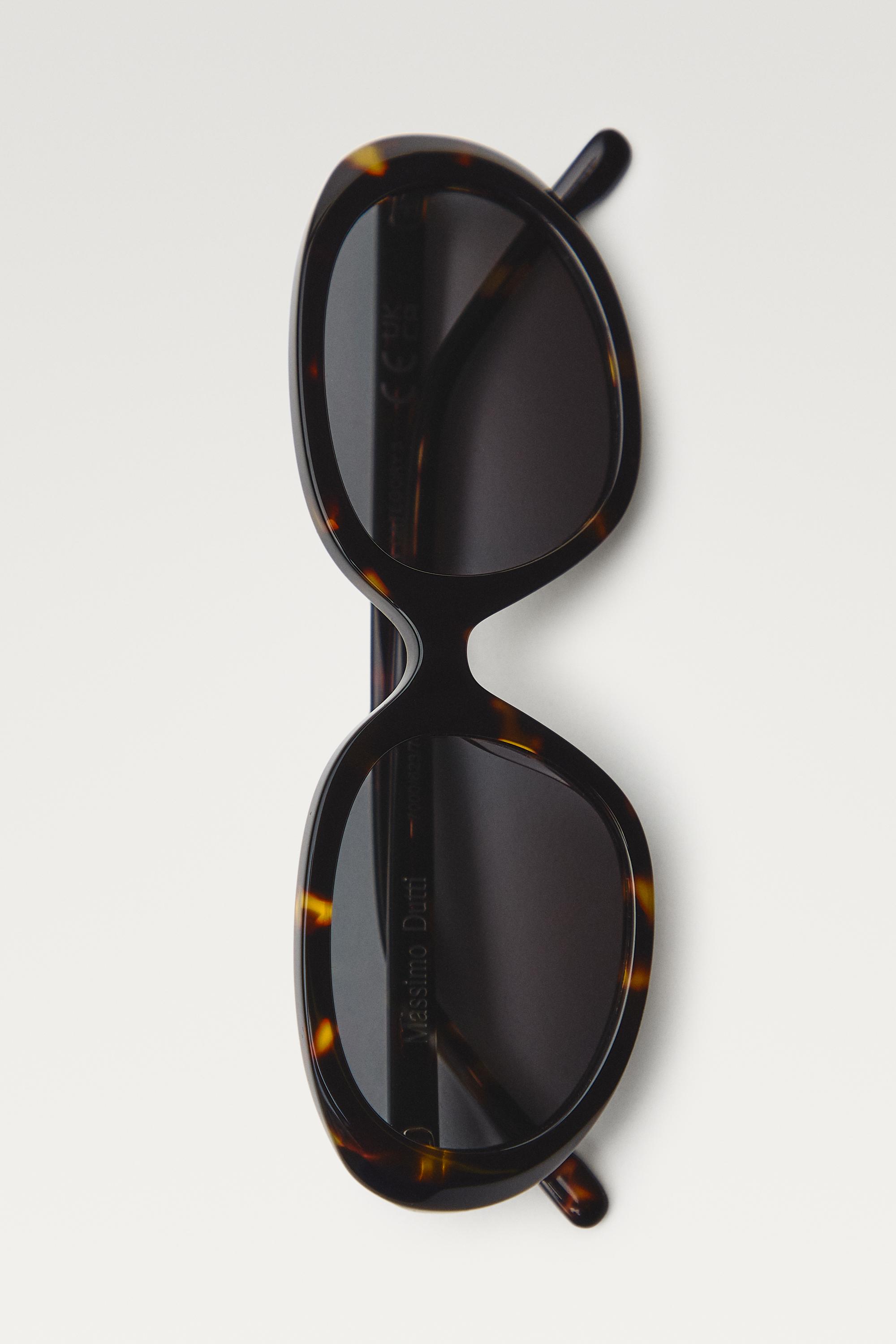Oval tortoiseshell-effect sunglasses — Brown