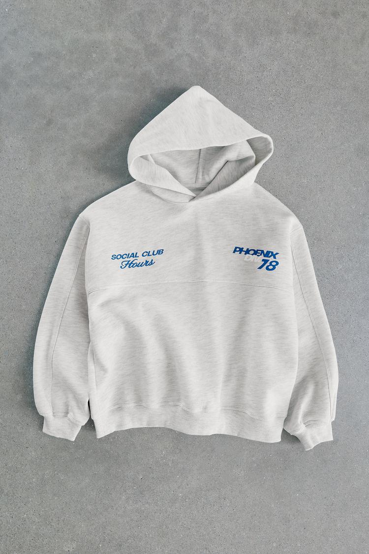 Sudadera capucha estampado texto