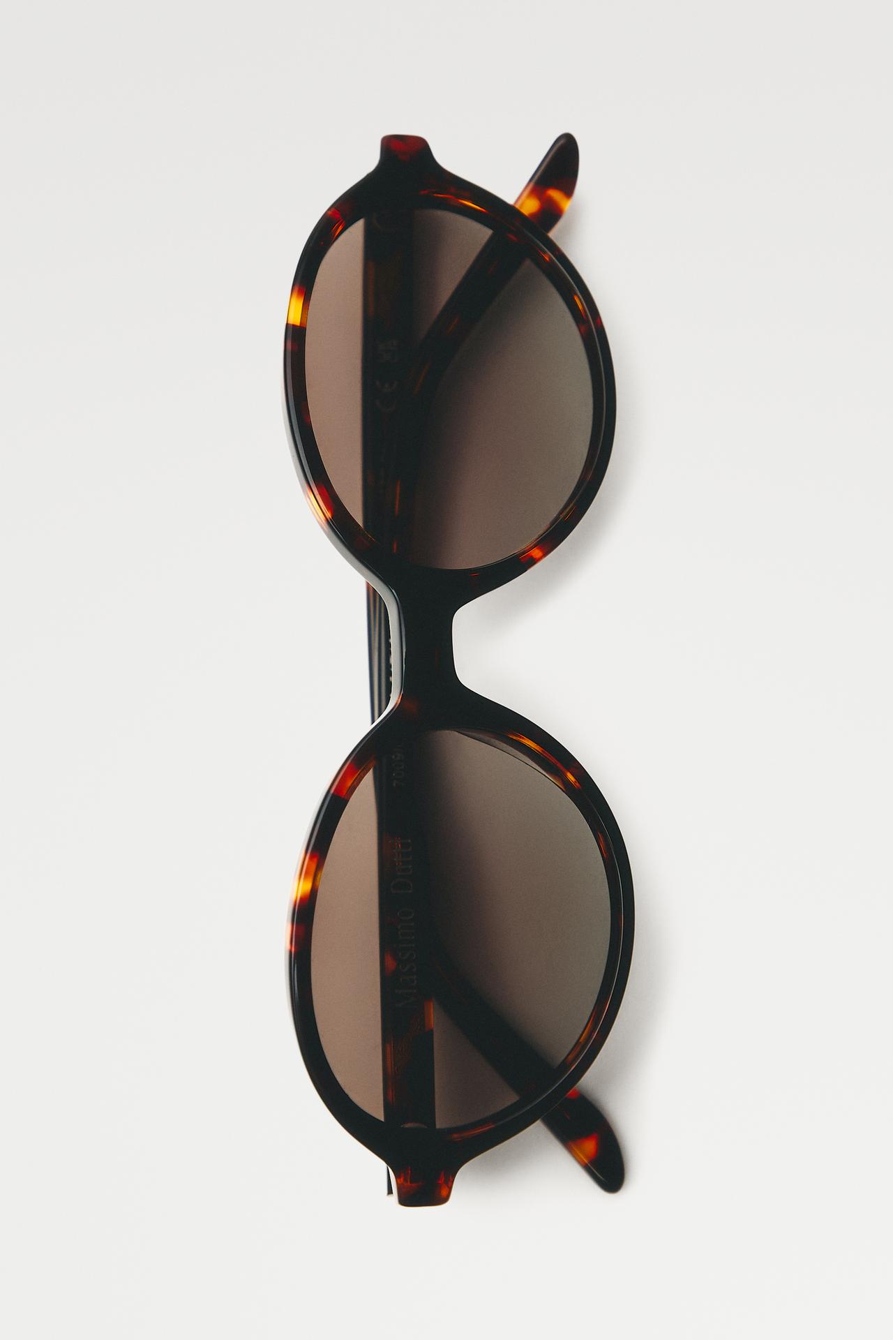 Oval tortoiseshell-effect sunglasses — Brown