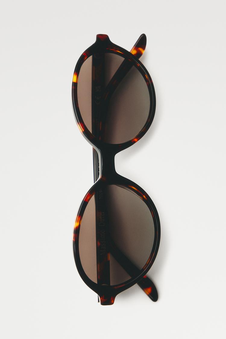 Oval tortoiseshell-effect sunglasses — Brown