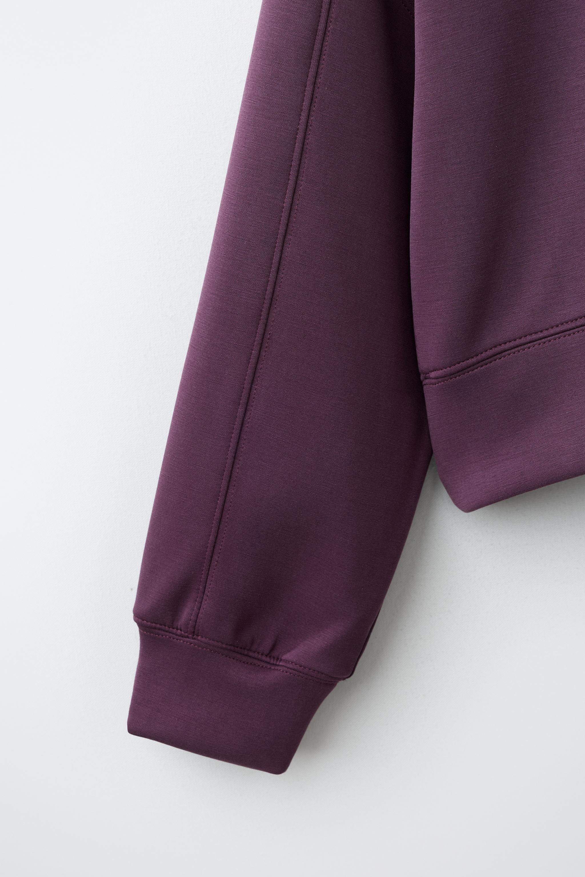 SPORTY EMBOSSED TEXT SWEATSHIRT