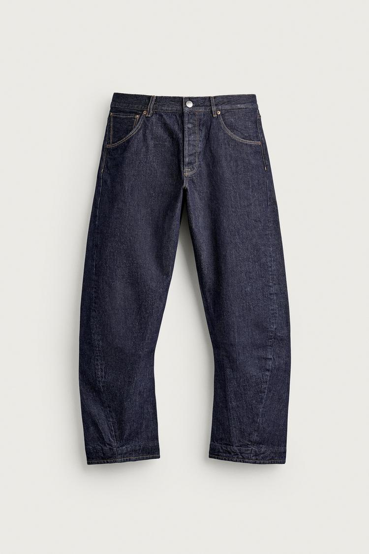 TWISTED-SEAM STRAIGHT-FIT JEANS — Indigo