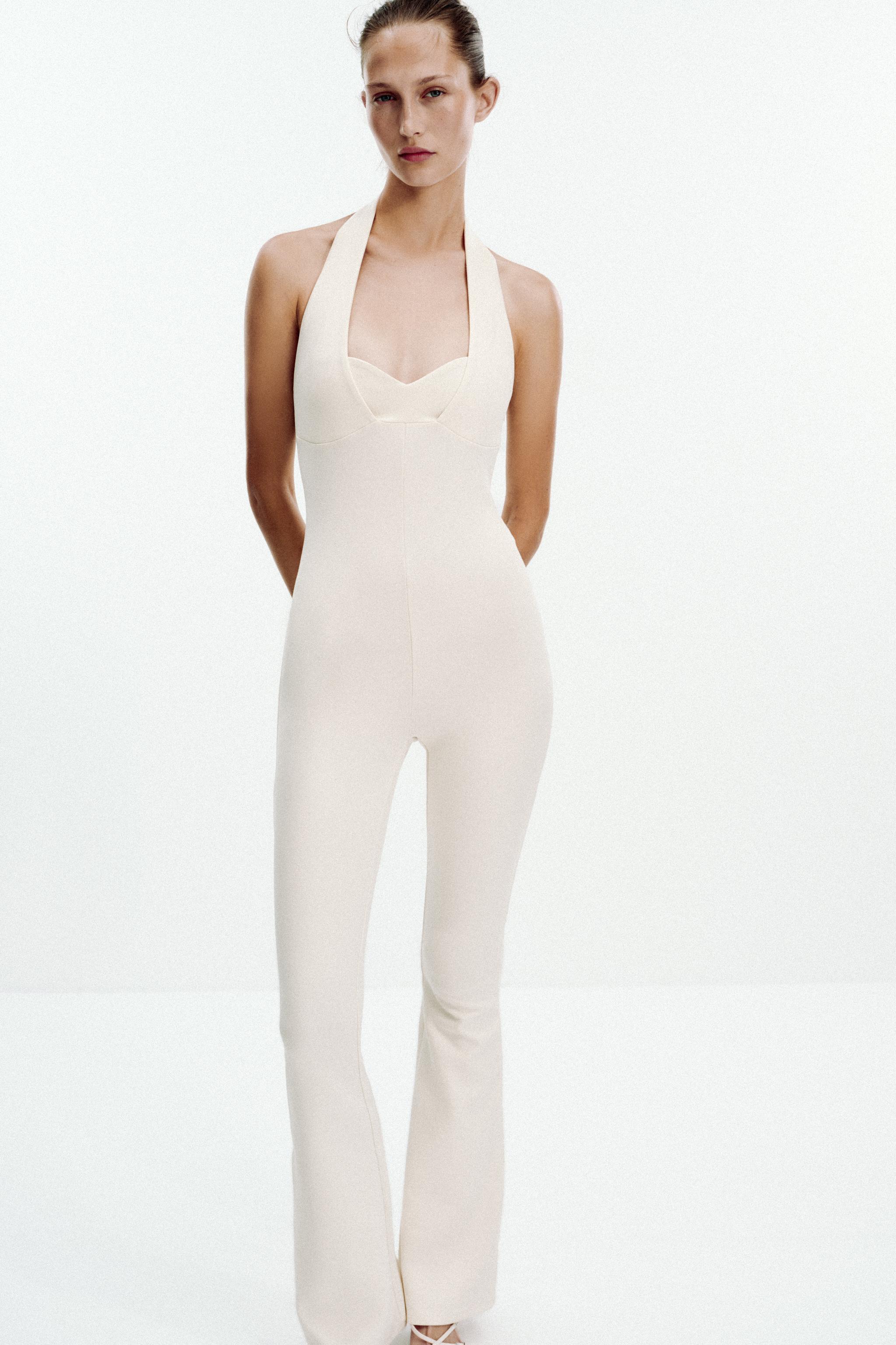 INTERLOCK FLARE JUMPSUIT