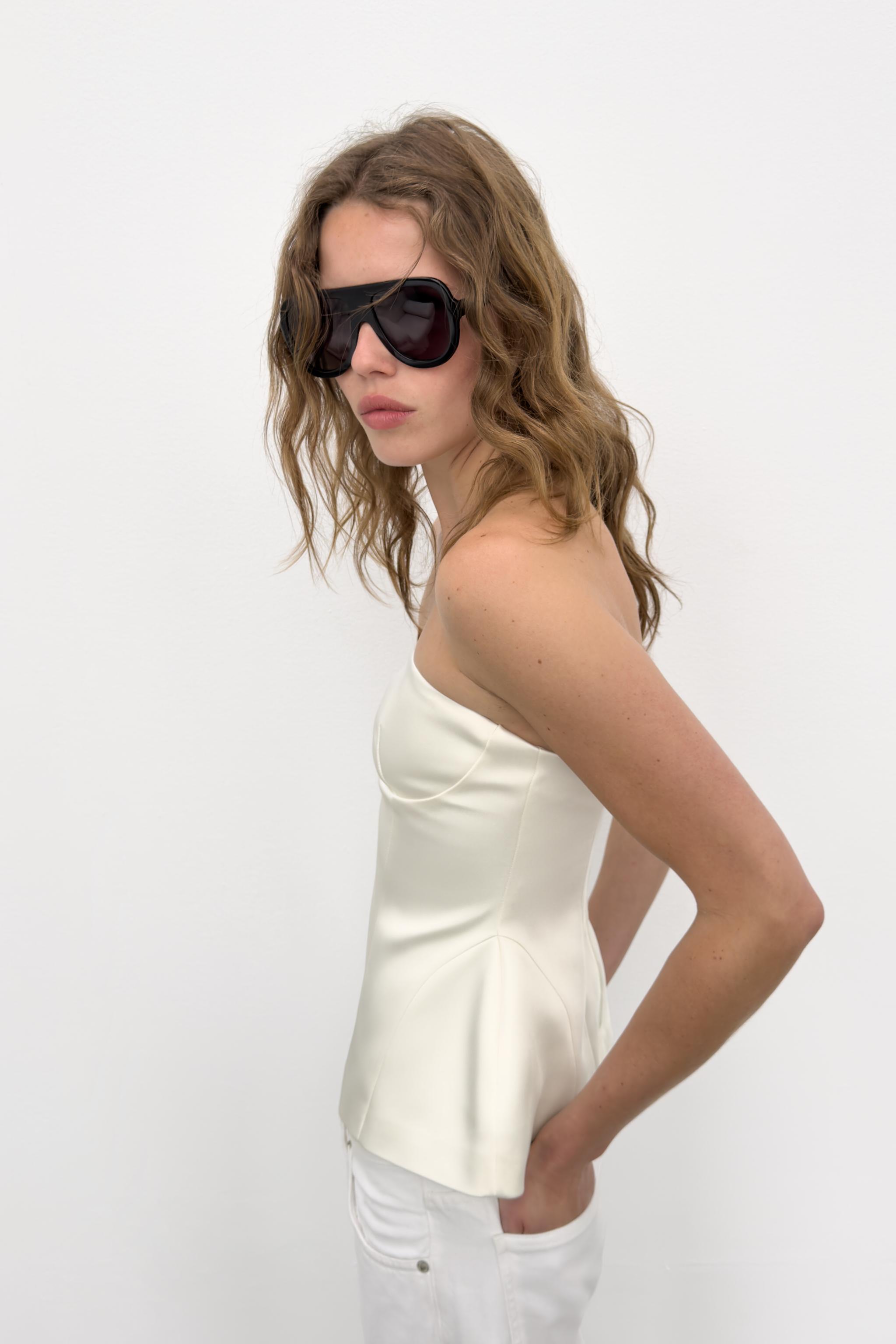 STRAPLESS PEPLUM TOP