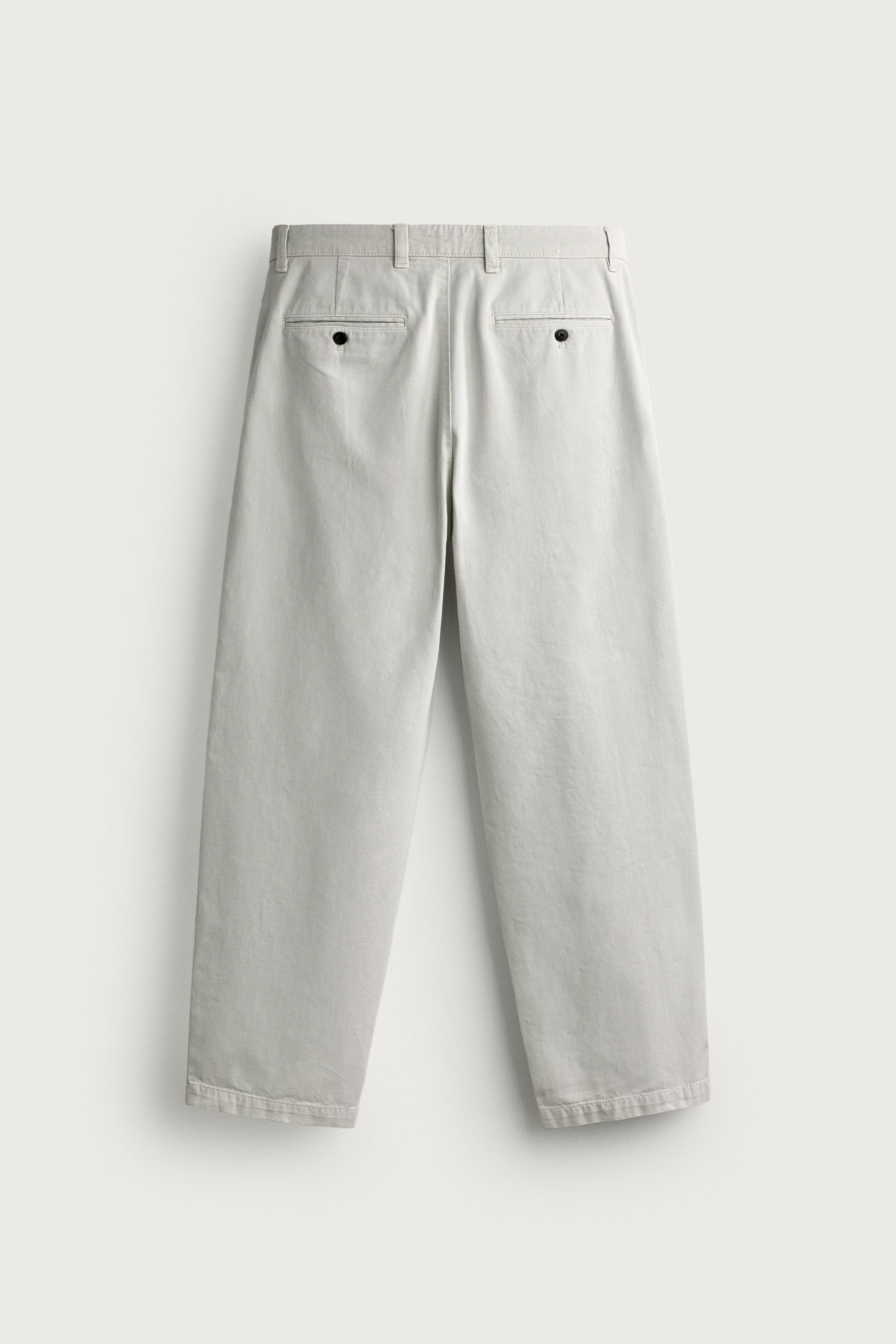 PLEATED STRAIGHT-FIT CHINO TROUSERS