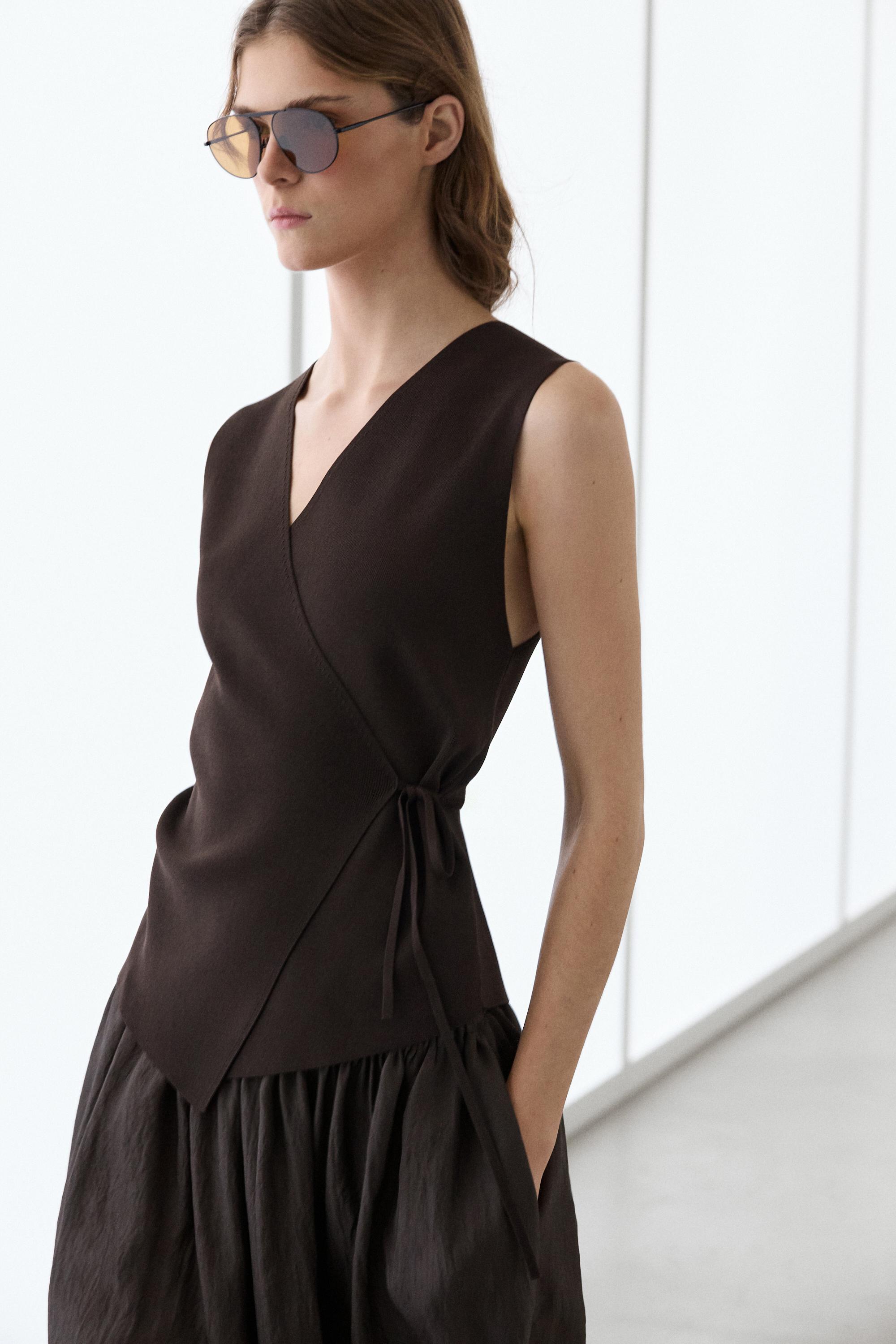 Crossover knit vest with tie detail