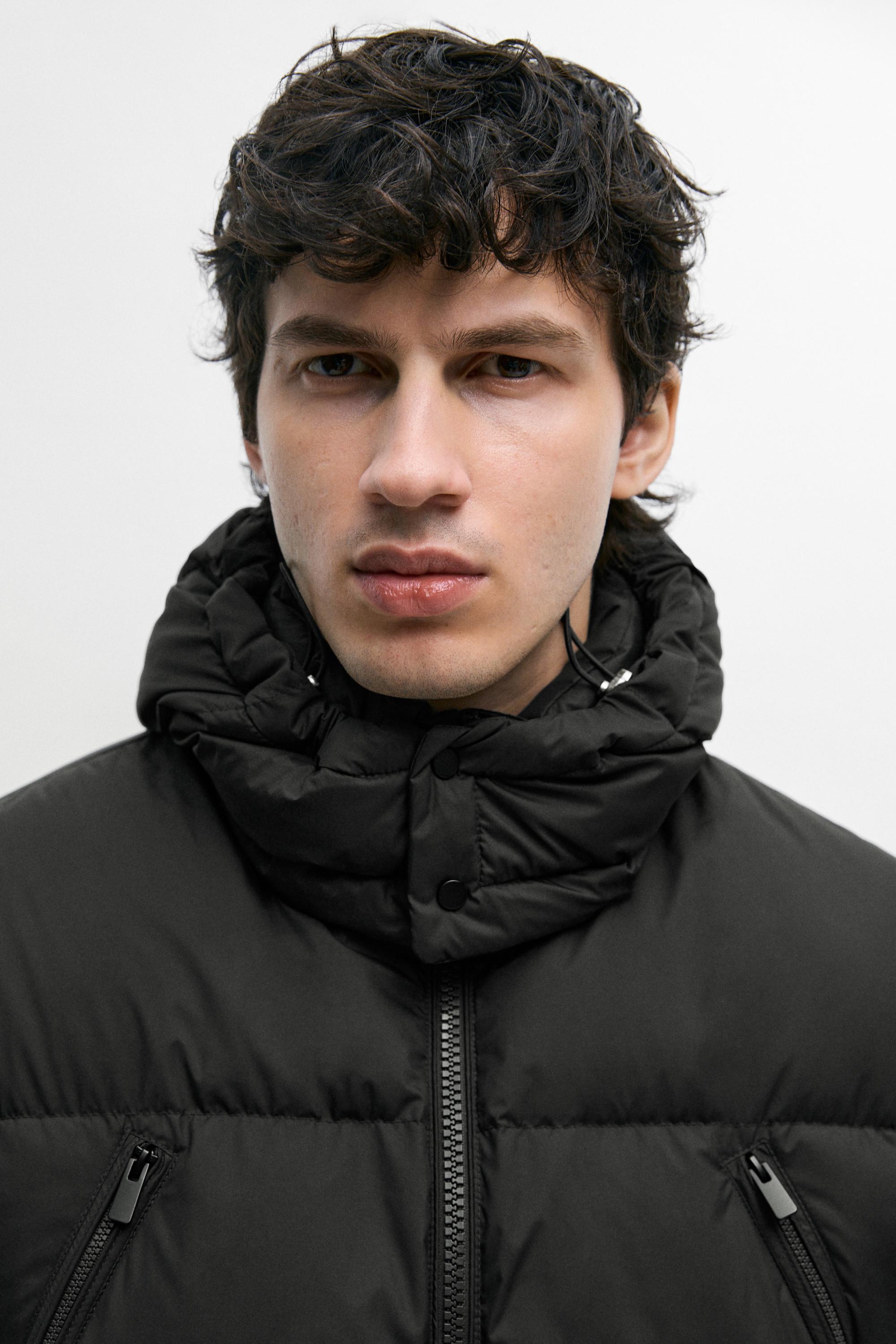 Down jacket with pocket detail