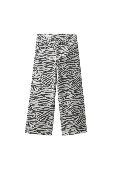 KAVBOJKE S ŠIROKIMI HLAČNICAMI IN ZEBRASTIM POTISKOM - Lisasto siva od Zare