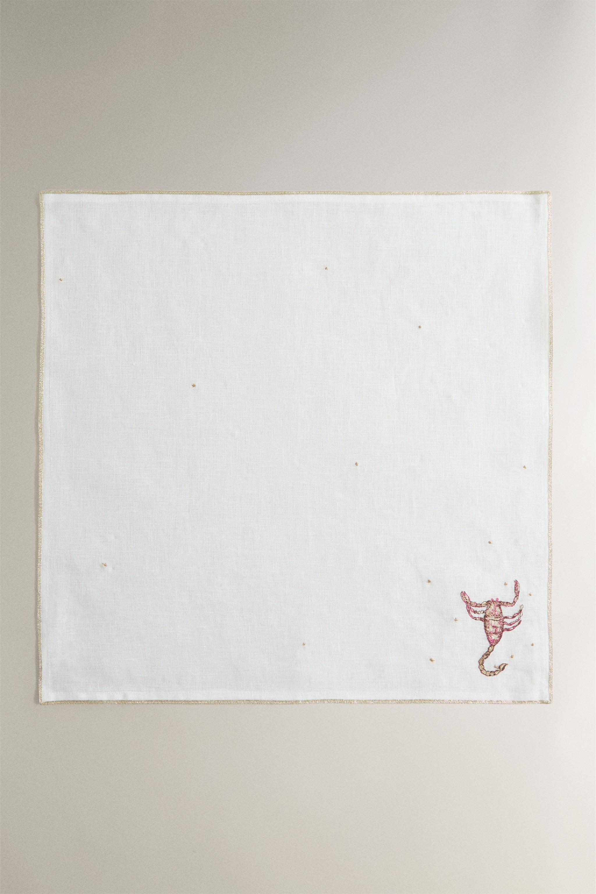 SCORPIO EMBROIDERED LINEN NAPKIN | MARISA BERENSON — Ecru