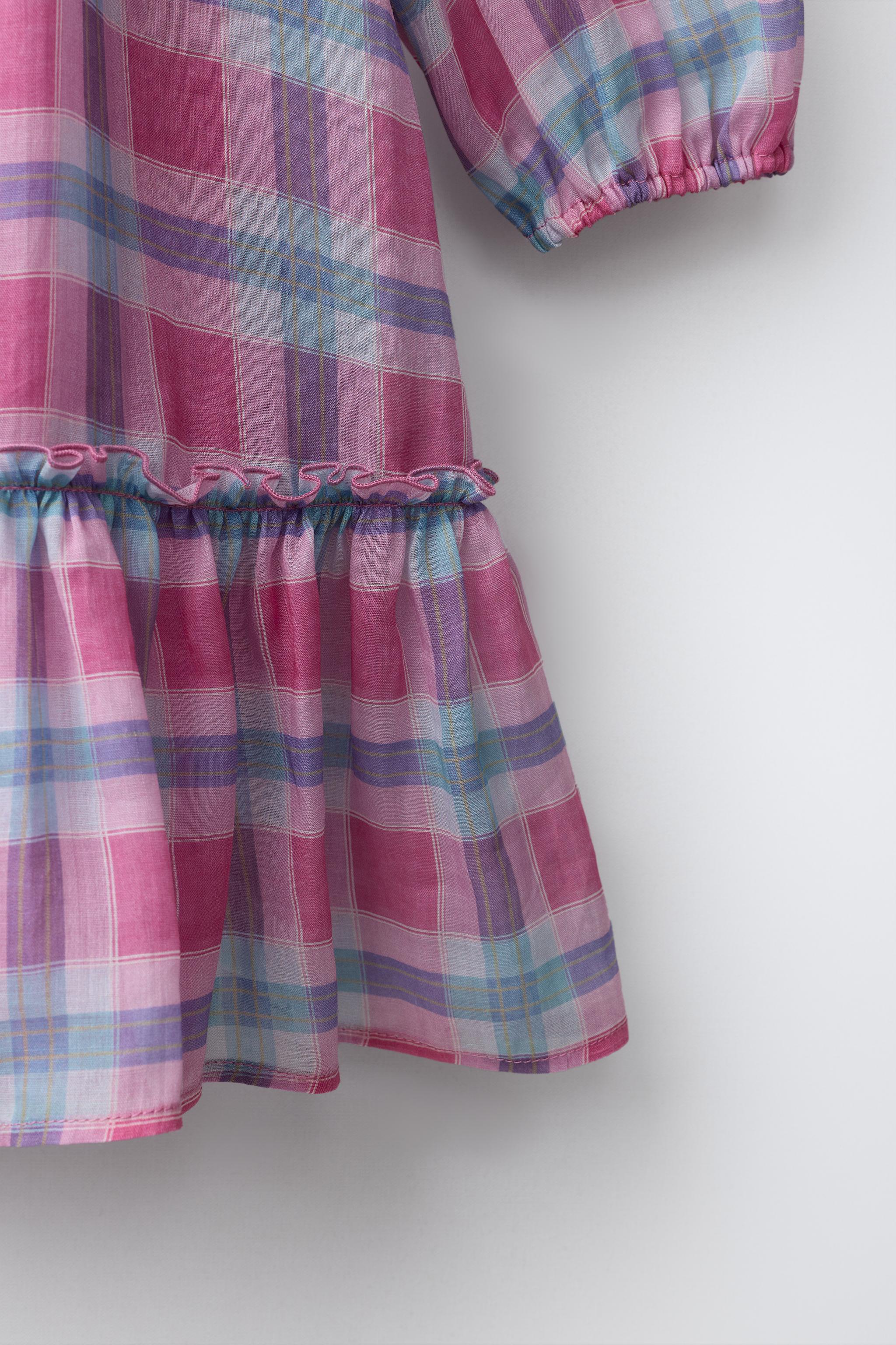 ROBE À CARREAUX ET COL CLAUDINE