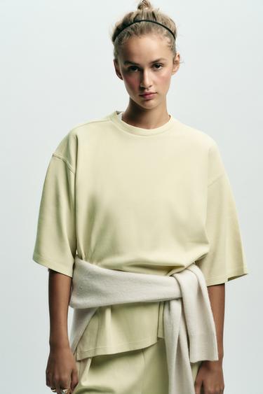 INTERLOCK-T-SHIRT MIT SCHLITZEN - Limette von Zara