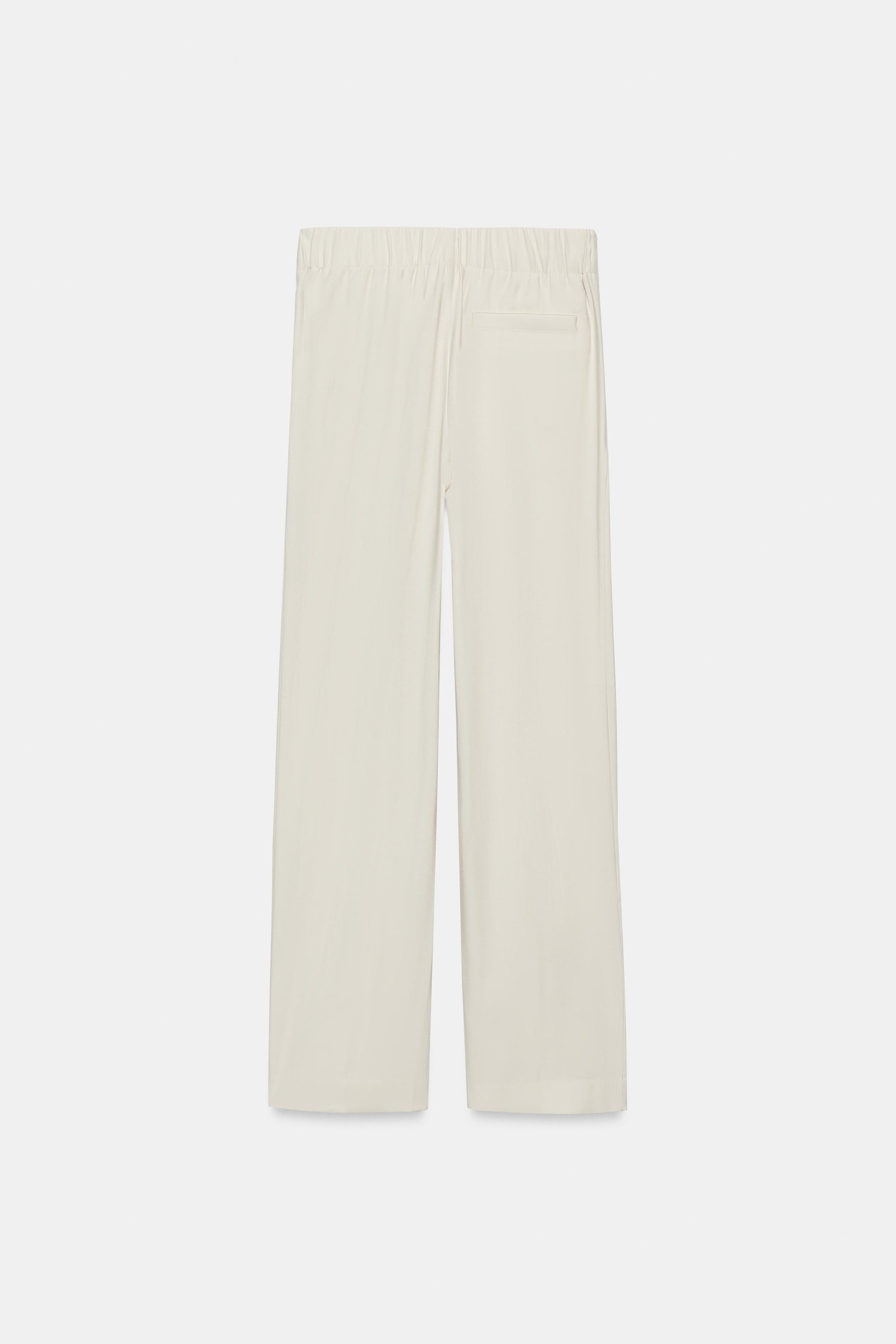 PLEATED FLOWY PANTS