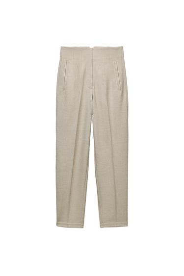 Front view of beige trousers with side pockets