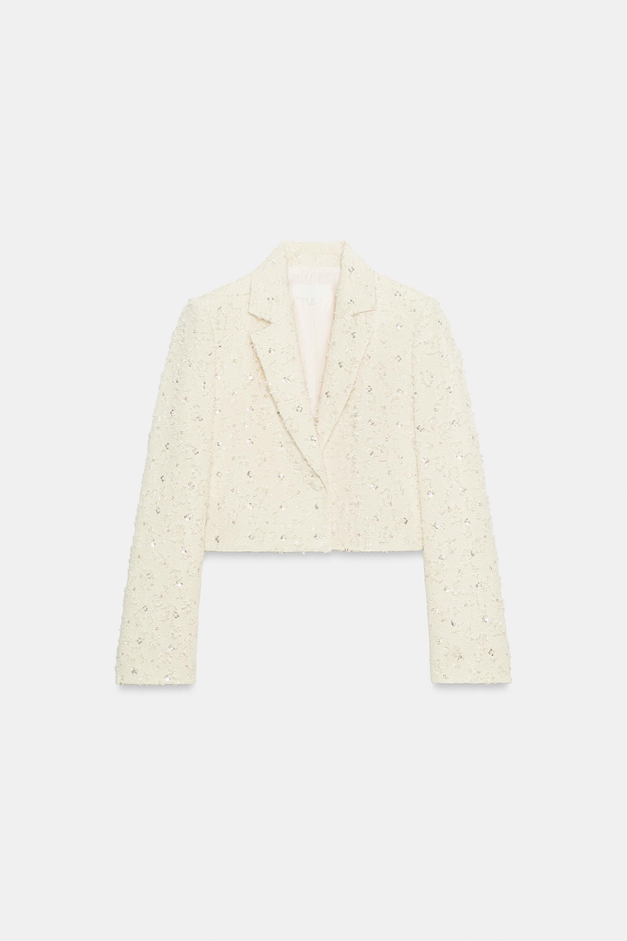 VESTE COURTE EFFRANGÉE À FANTAISIE