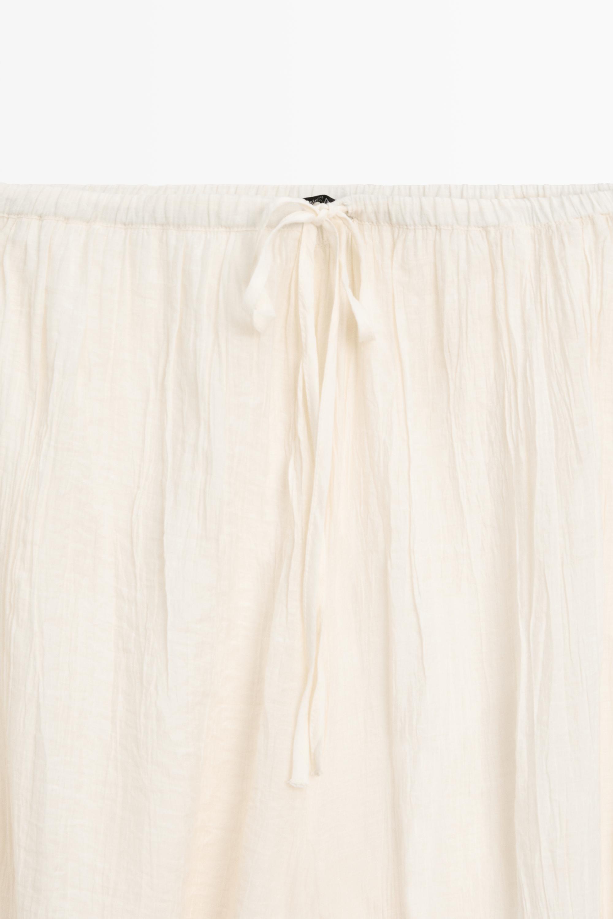 Flowing sarouel trousers with embroidered detail