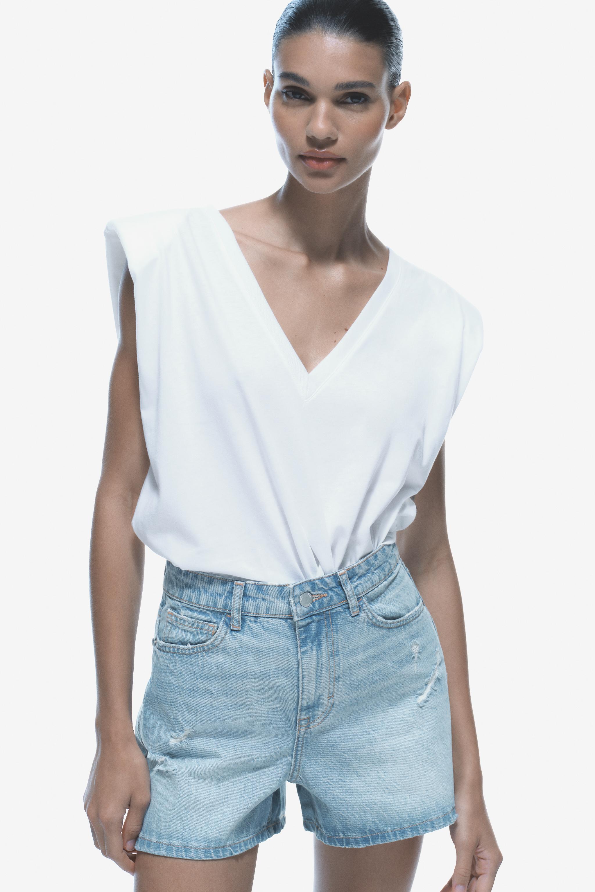 T SHIRT WITH V NECKLINE AND SHOULDER PADS