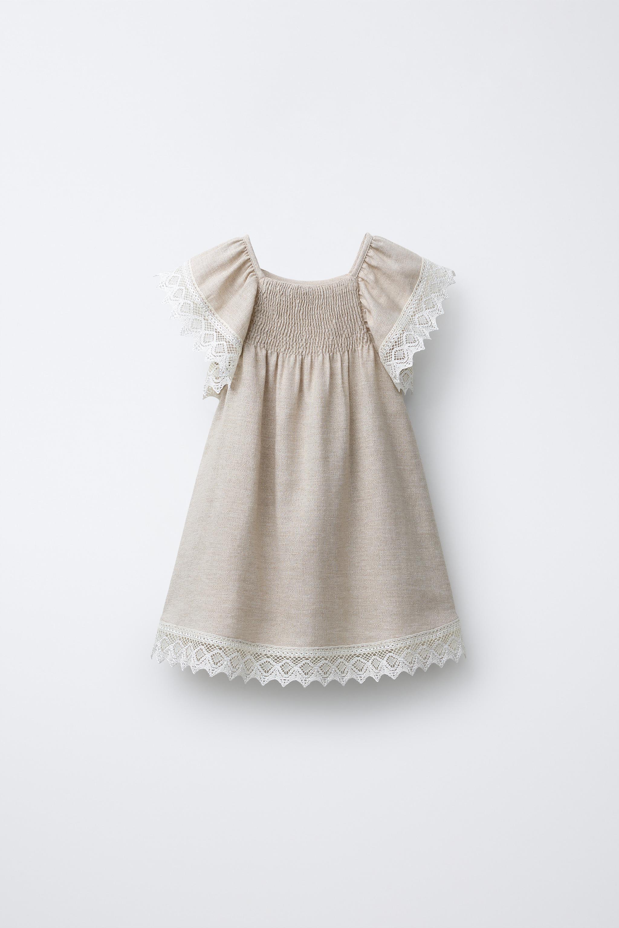 ROBE BRILLANTE AVEC DENTELLE