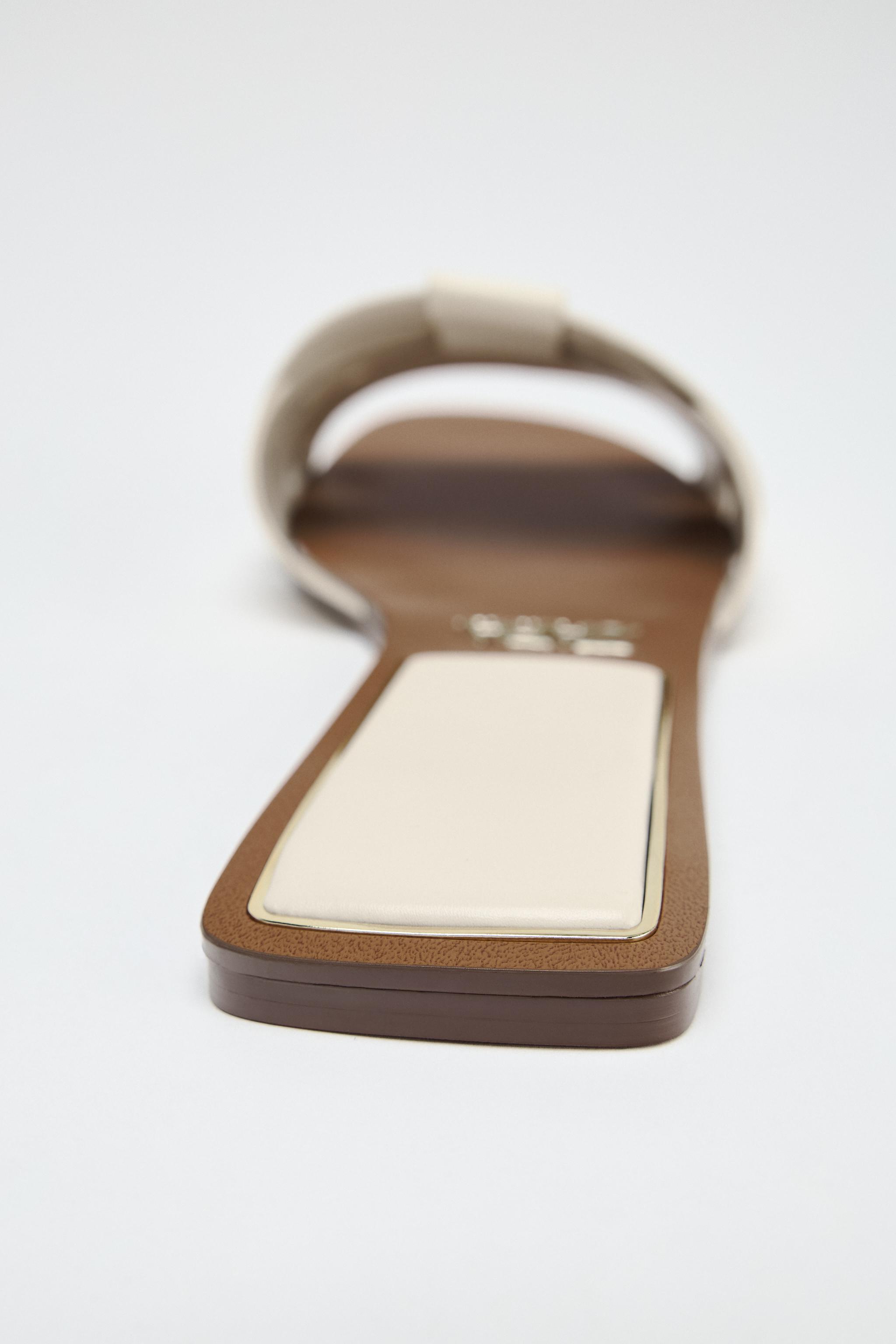 FLAT CROSSED LEATHER SANDALS - Gold | ZARA United States