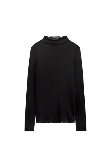 Black long-sleeved polo neck jumper, presented on a white background.