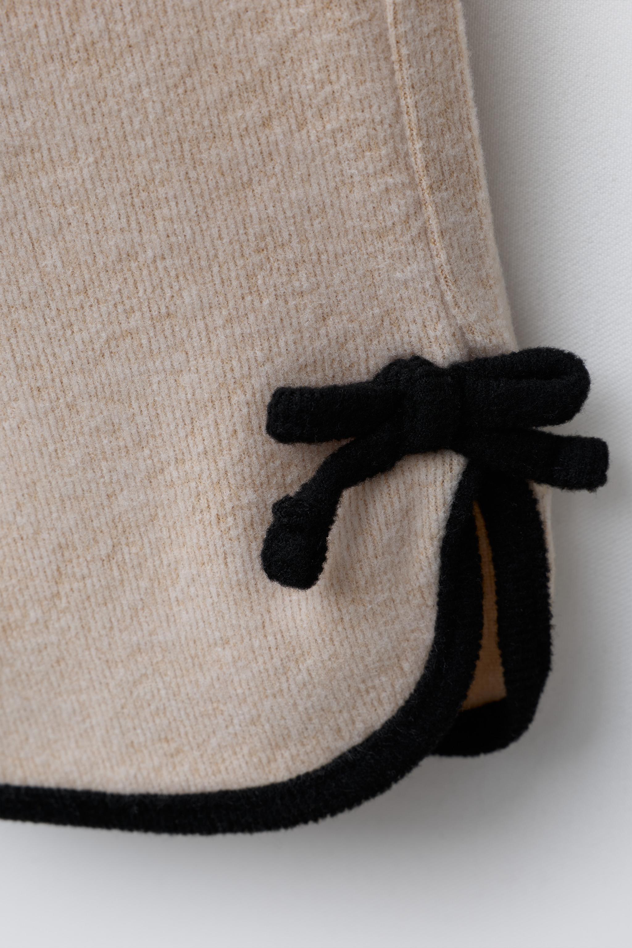 PANTALON JUPE-CULOTTE SOFT TOUCH AVEC DÉCOR NOEUD EN CONTRASTE