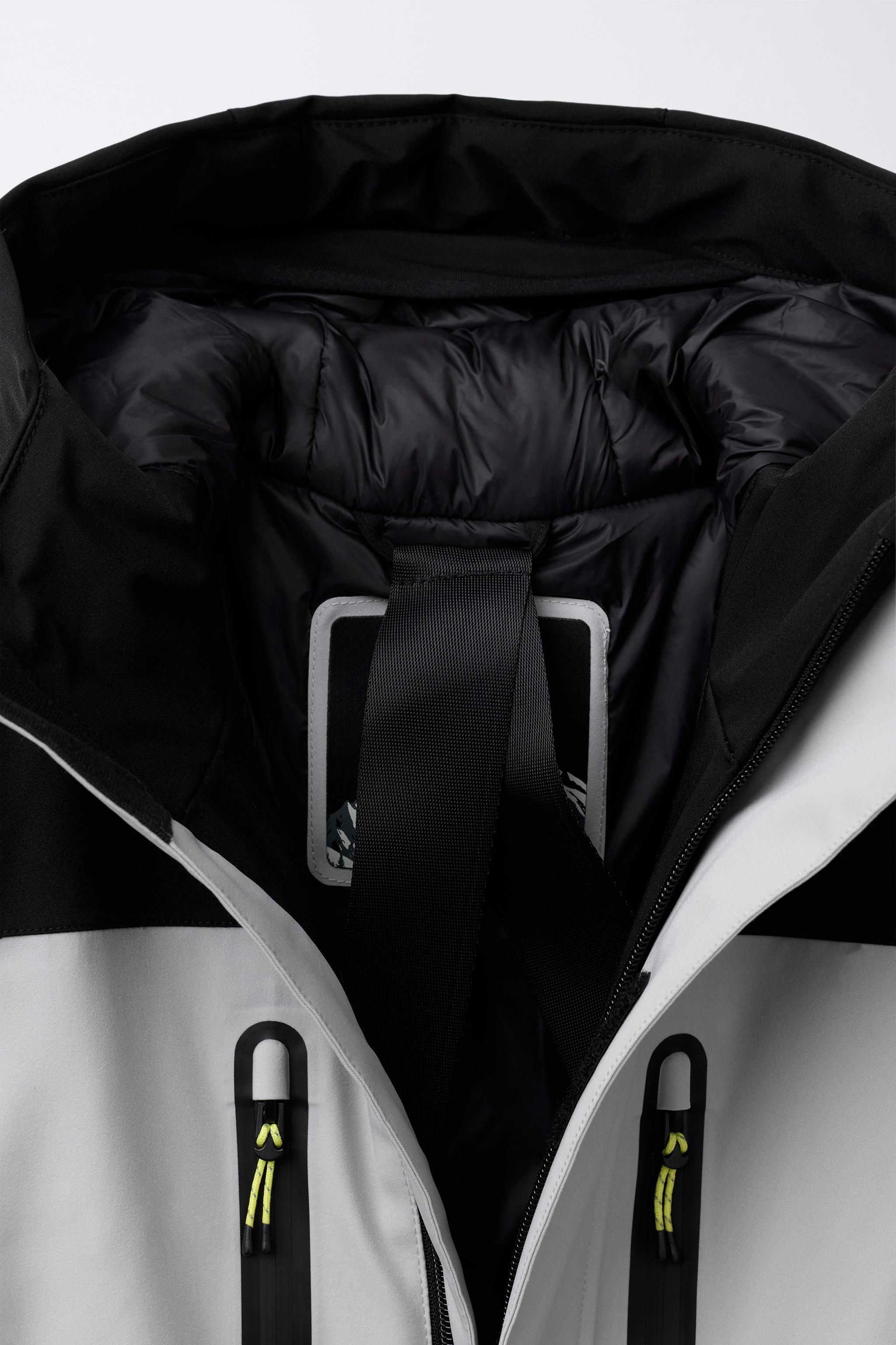 WINDPROOF AND WATER RESISTANT RECCO® SYSTEM SKI COLLECTION JUMPSUIT