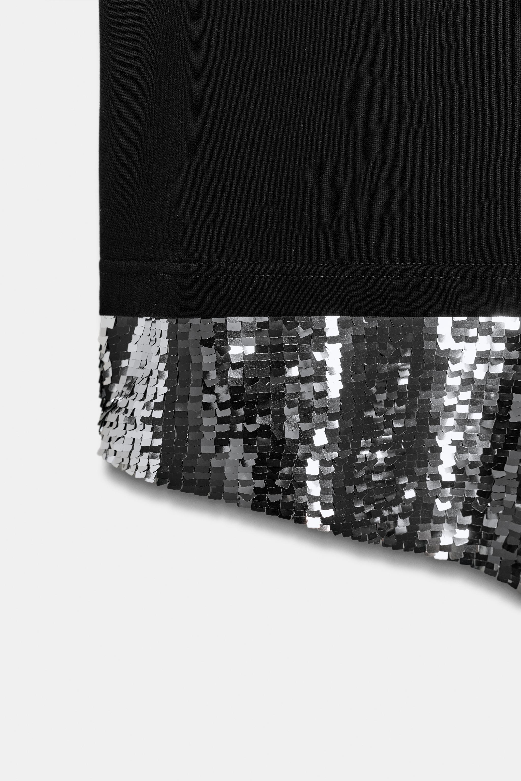 T-SHIRT ASYMÉTRIQUE PAILLETTES