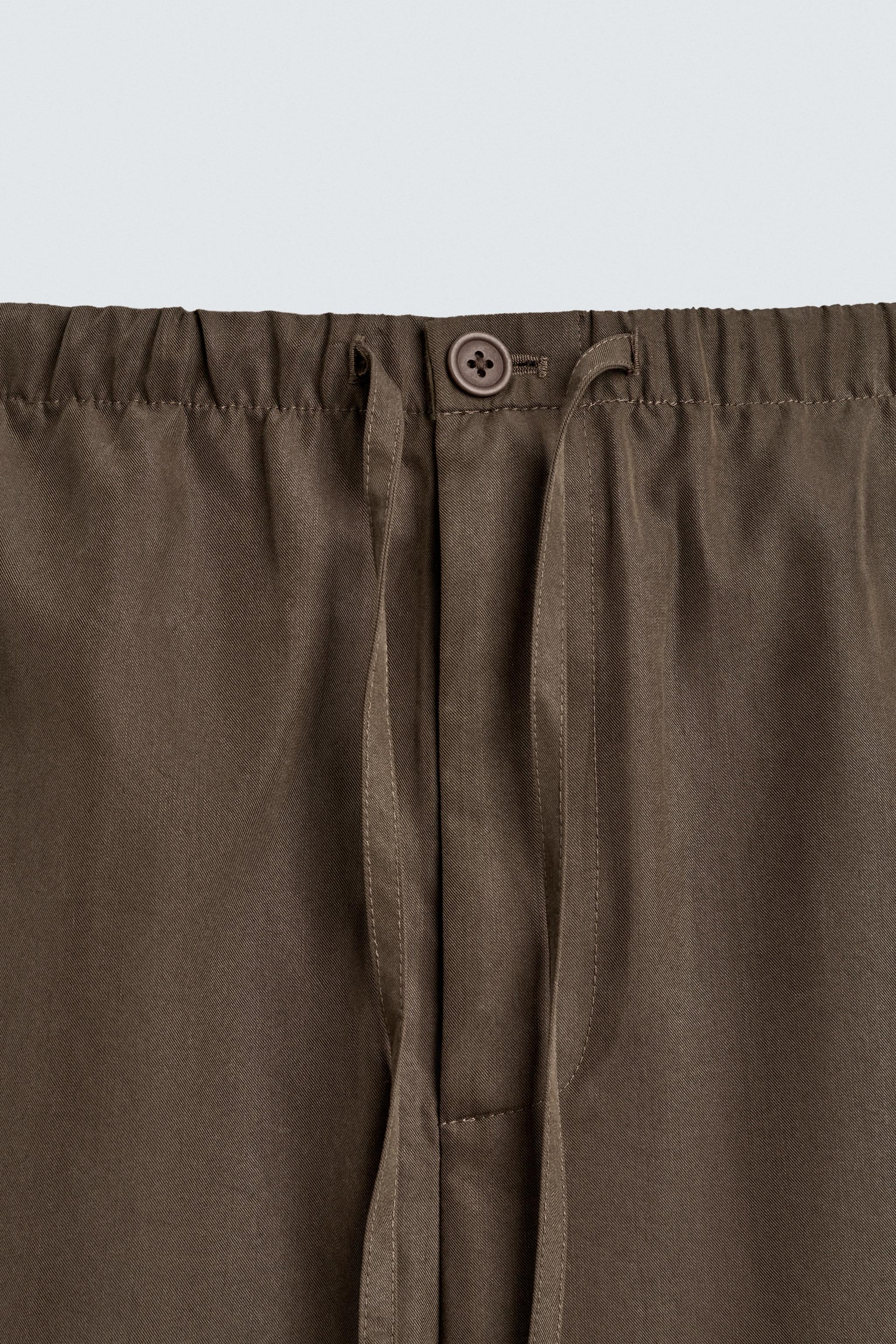 FLOWY WIDE FIT PANTS
