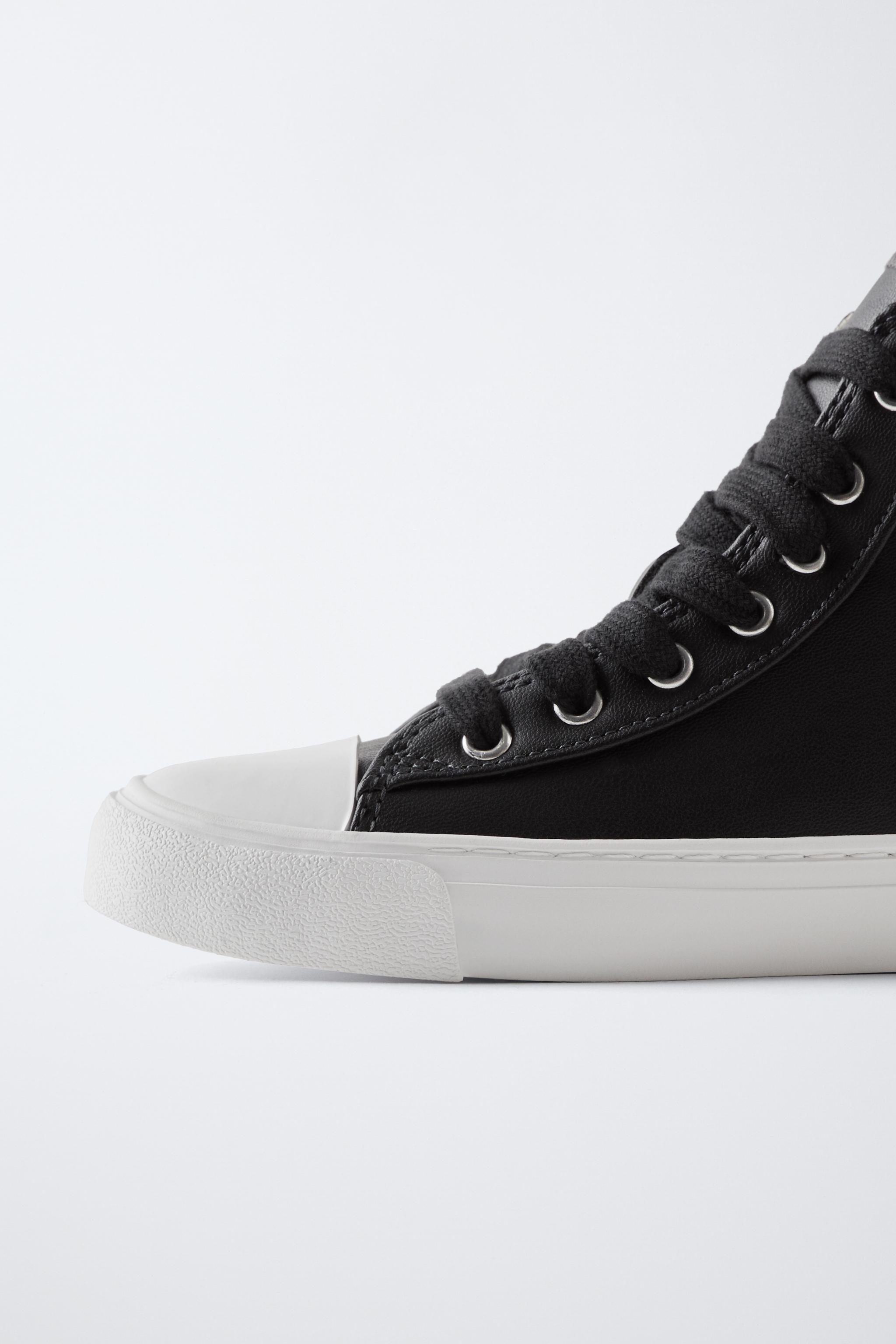 white and black high tops