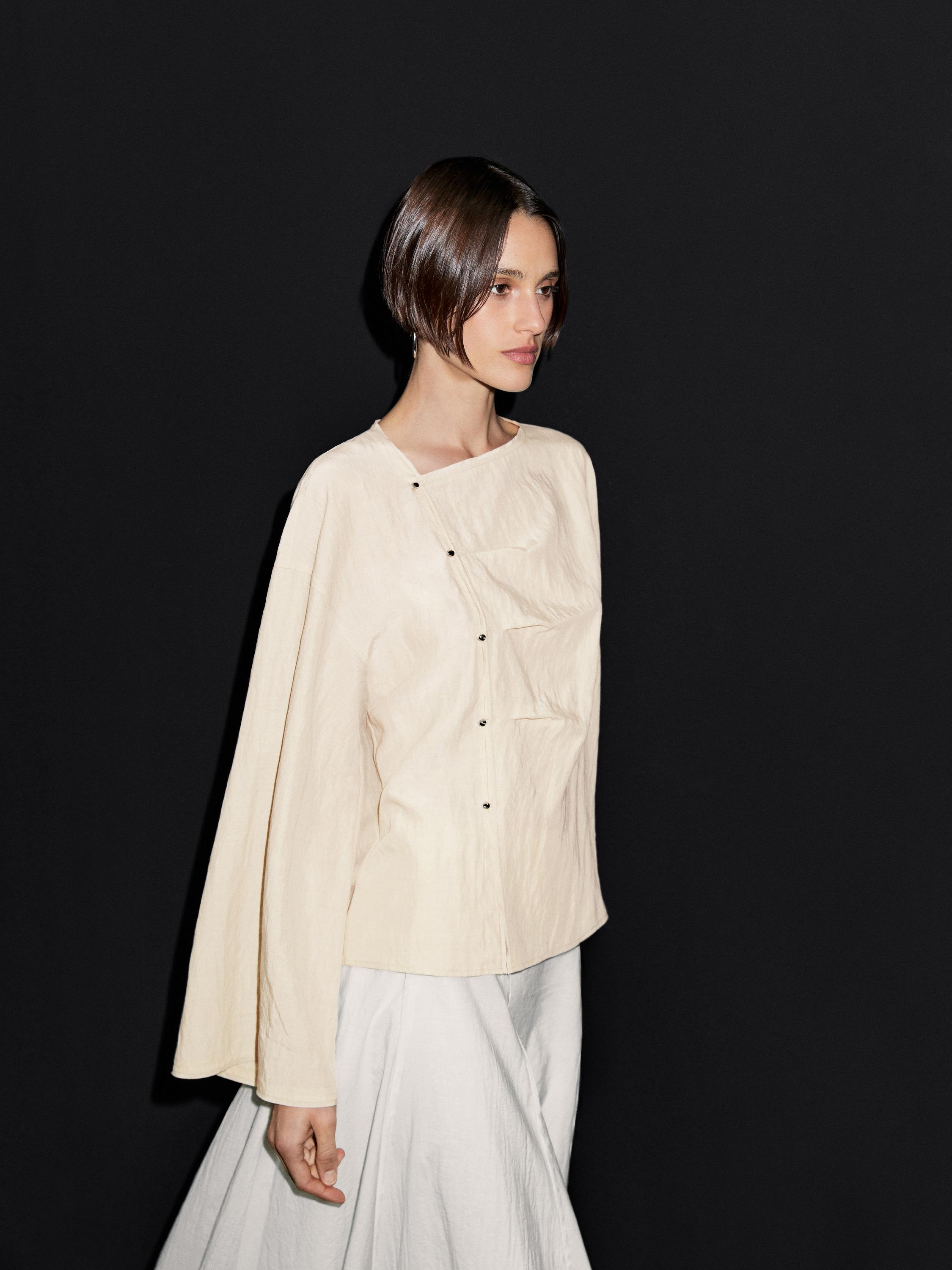Long sleeve blouse with side button fastening