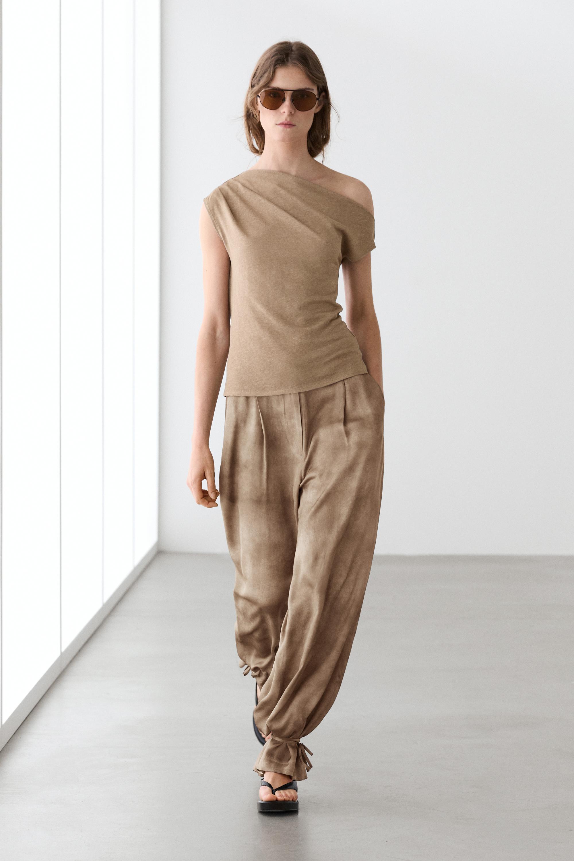 Flowing pants with tie-detail hem
