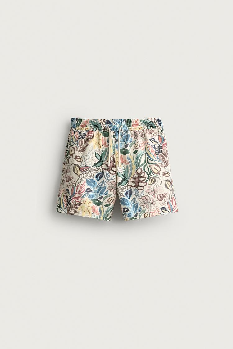 LONG FLORAL PRINT SWIM TRUNKS — Multicolored
