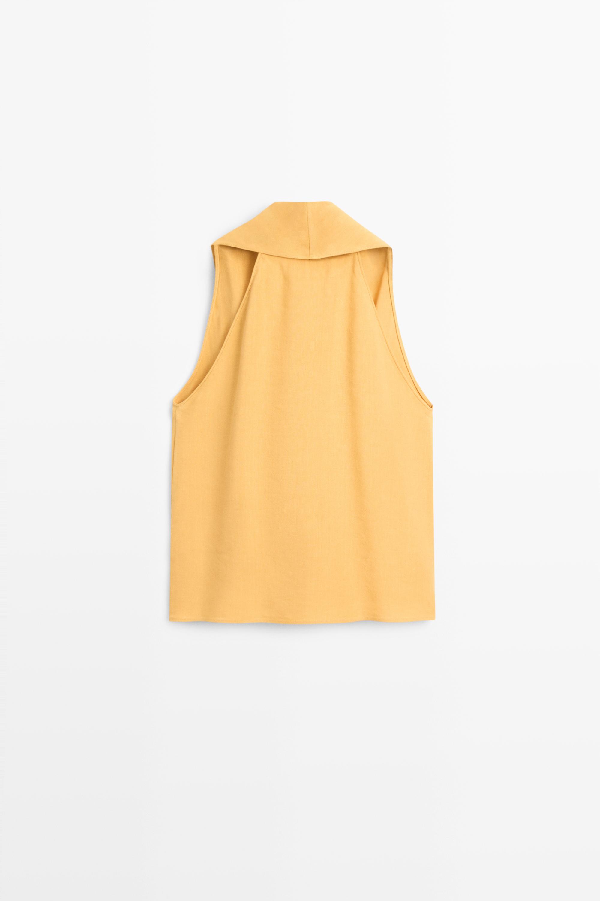 Flowing halter top with ruffle detail