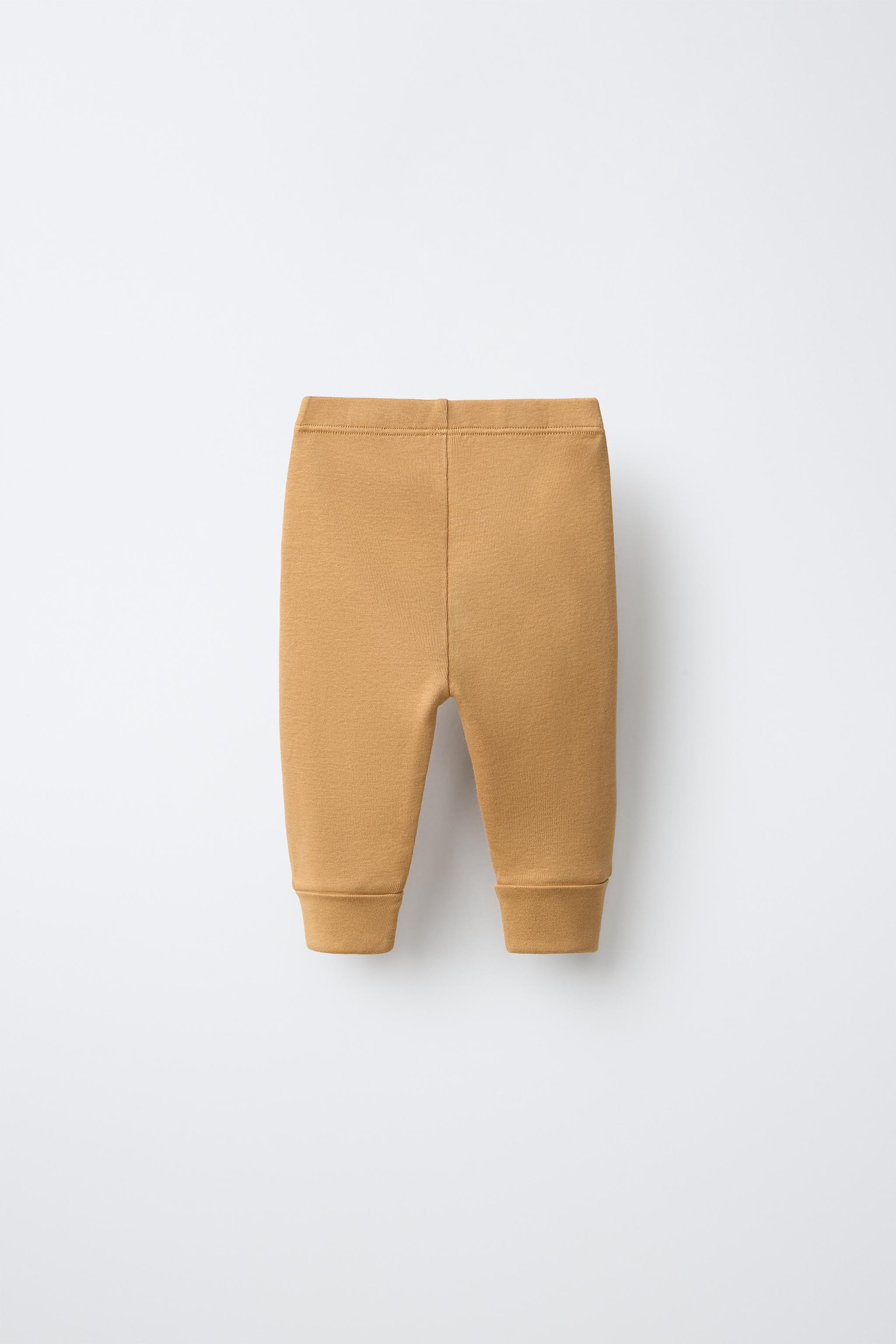 LOT DE TROIS LEGGINGS LONGS AJUSTABLES À RAYURES