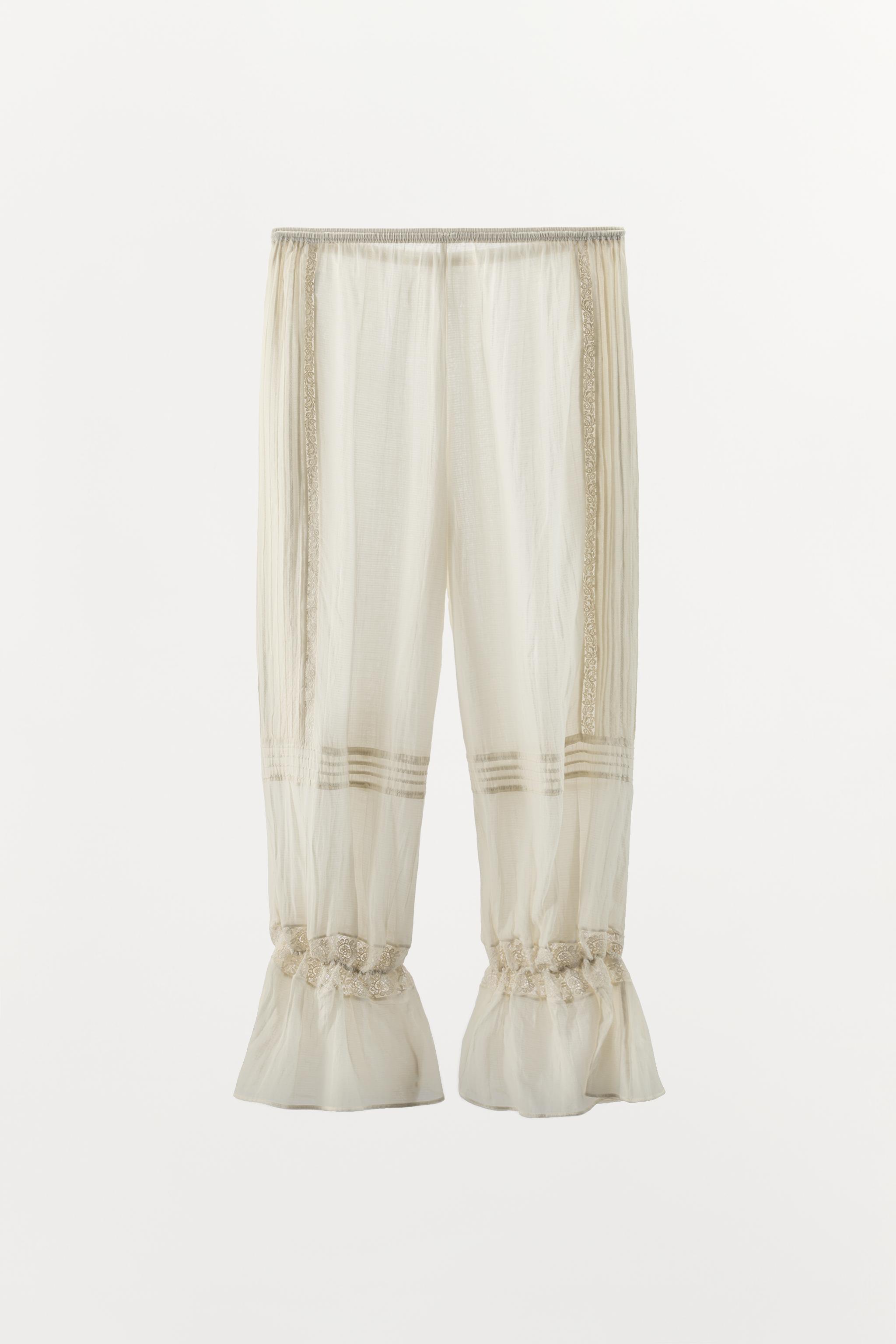 PANTALON EN VISCOSE À VOLANT ET DENTELLE