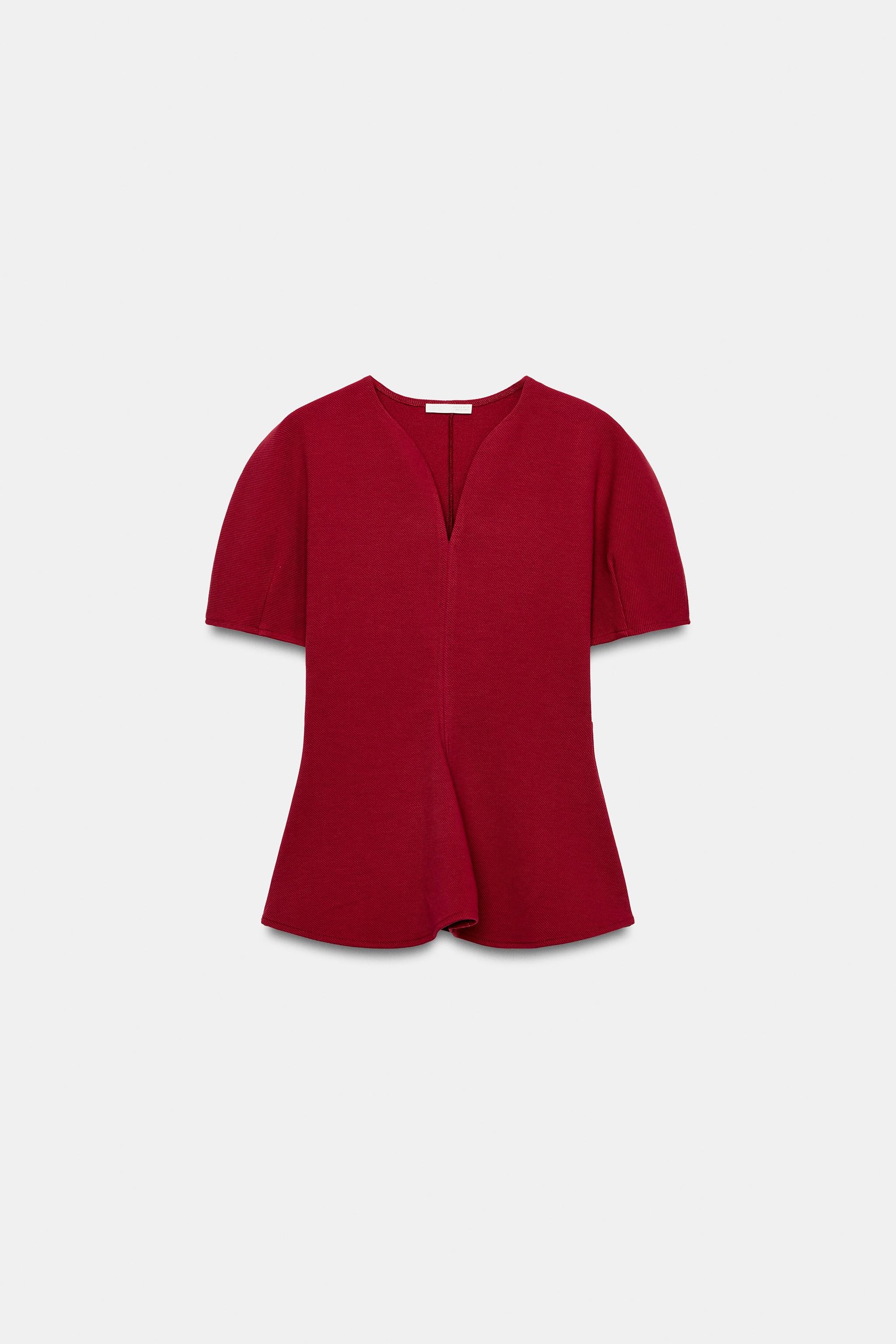 TOP PÉPLUM À MANCHES BOUFFANTES