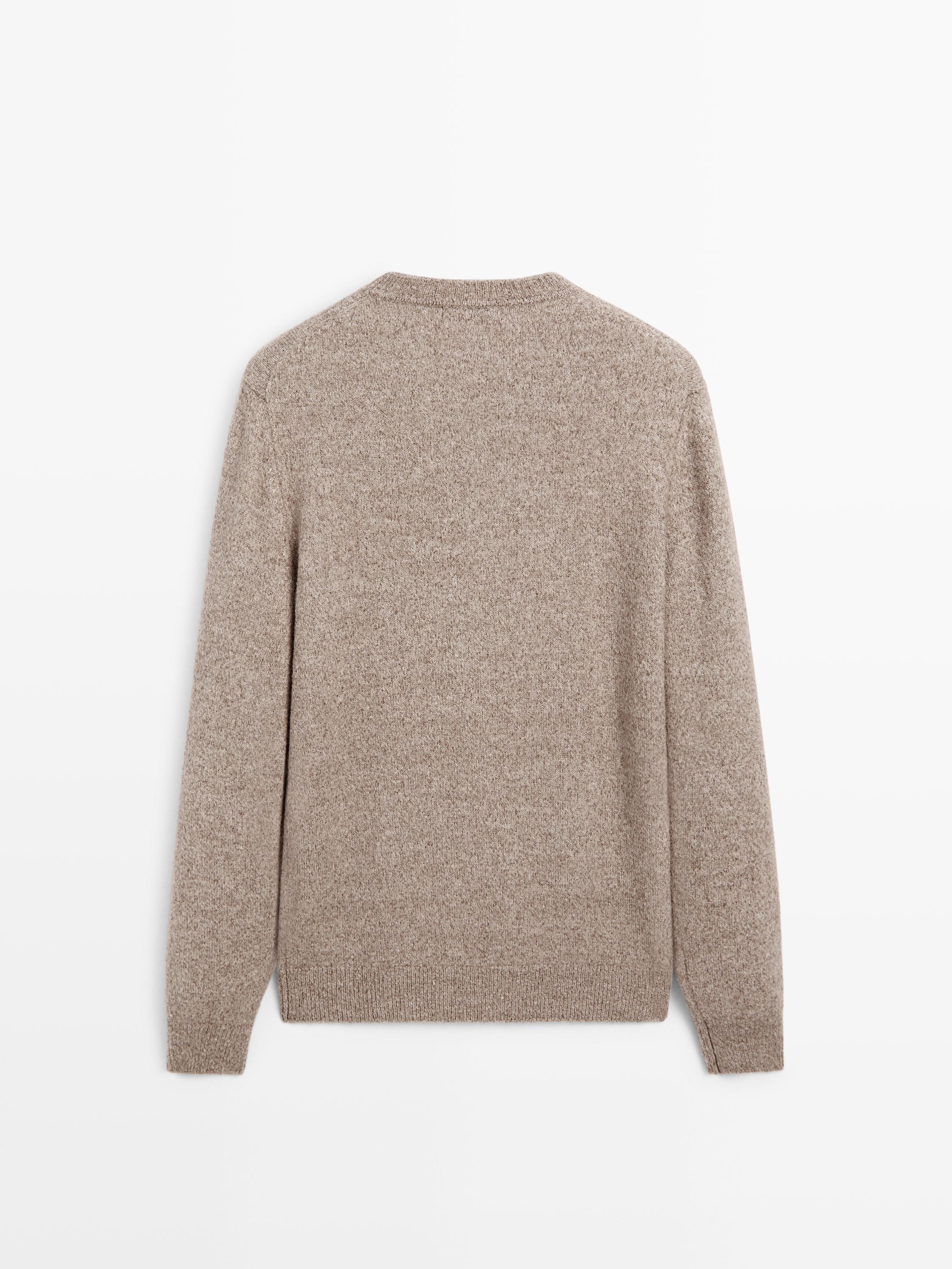 Flecked crew neck knit sweater