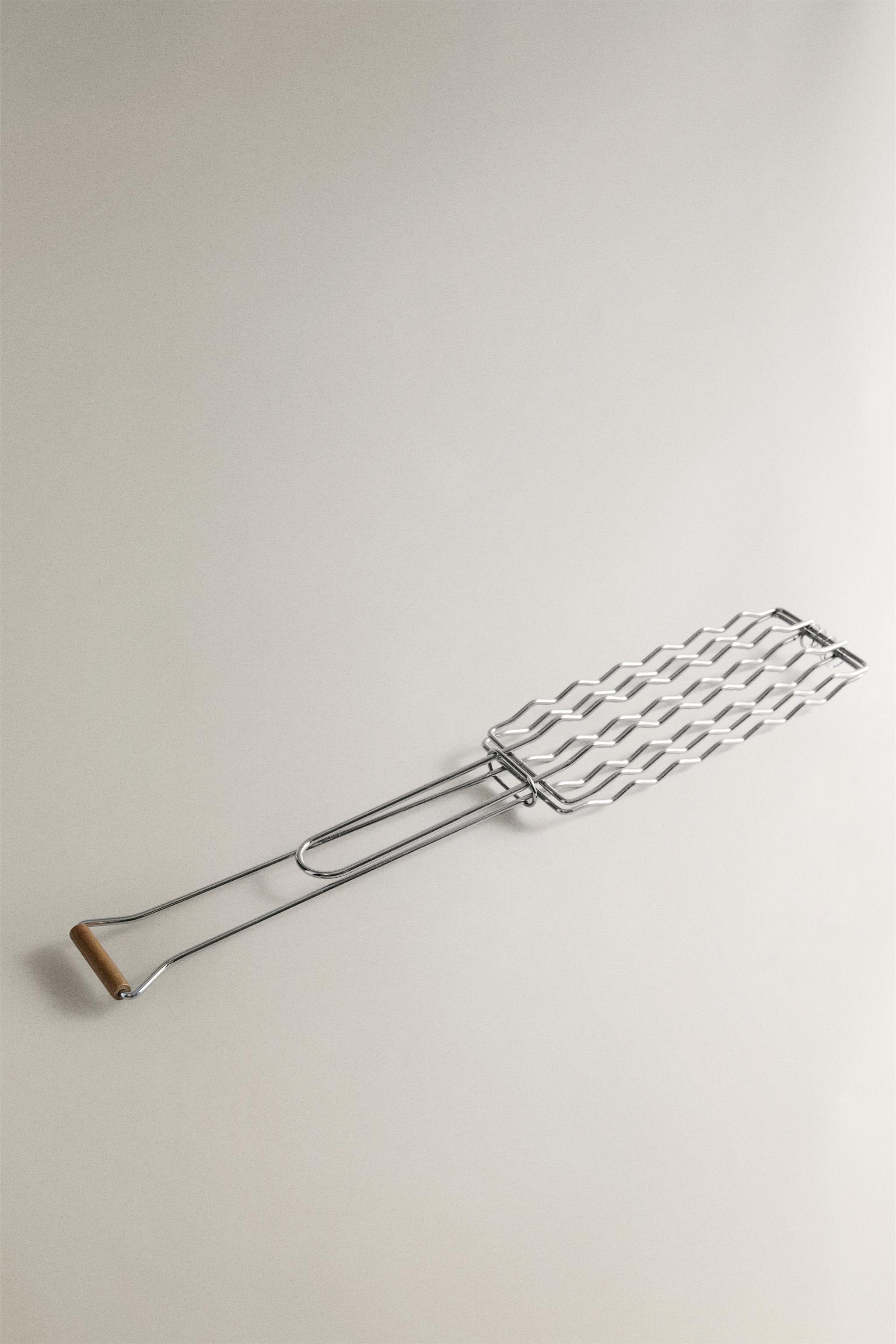 STEEL SAUSAGE BBQ GRILL