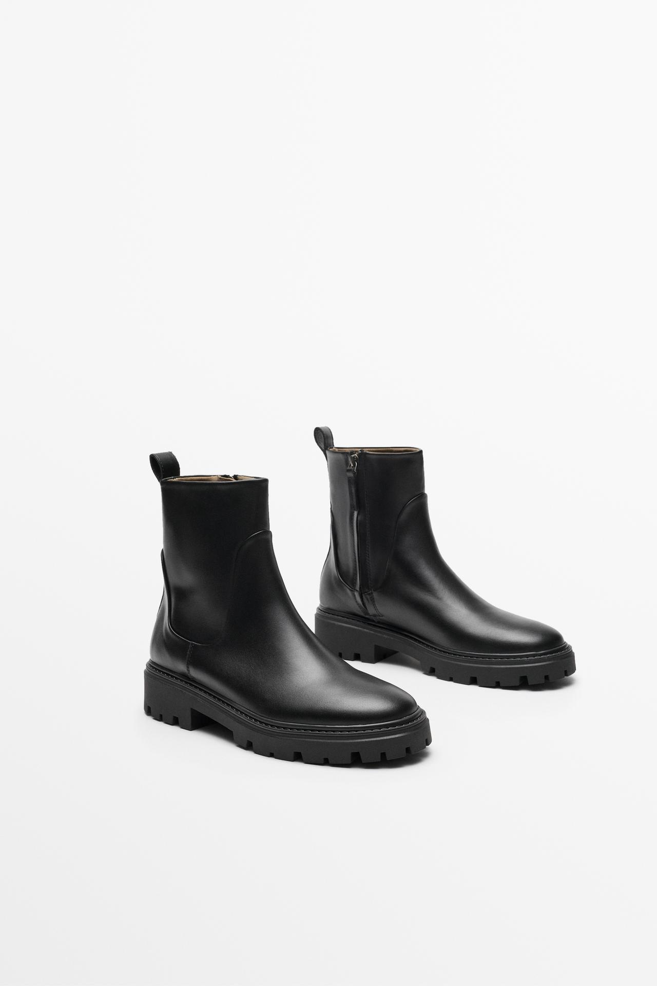Flat leather ankle boot with track sole — Black