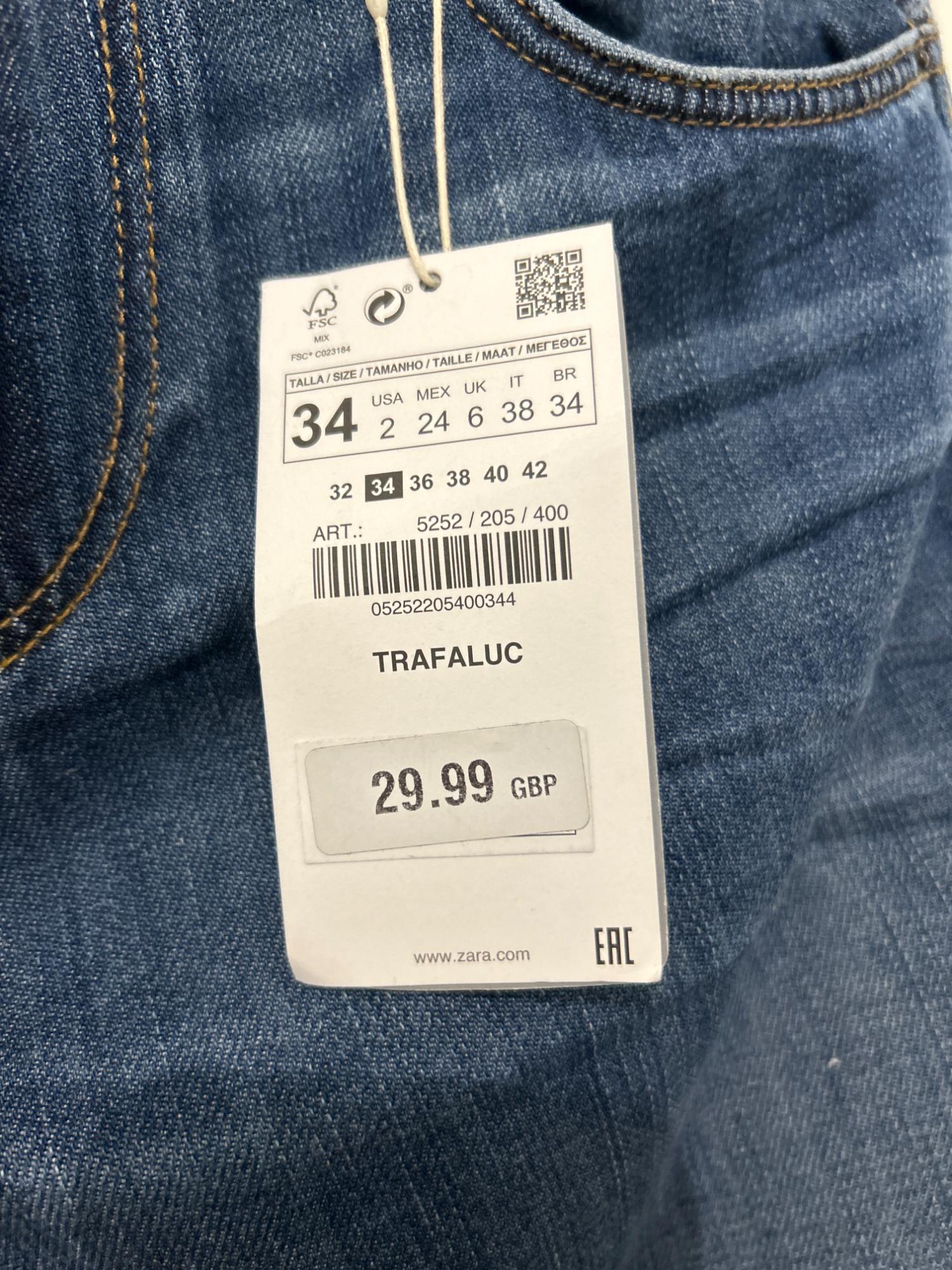 BLUE RIPPED SLOUCHY JEANS