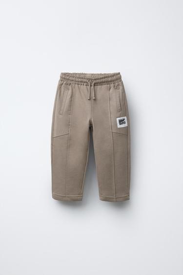 PANTALÓN COMBINADO ETIQUETA - Beige claro de Zara - Imagen 0