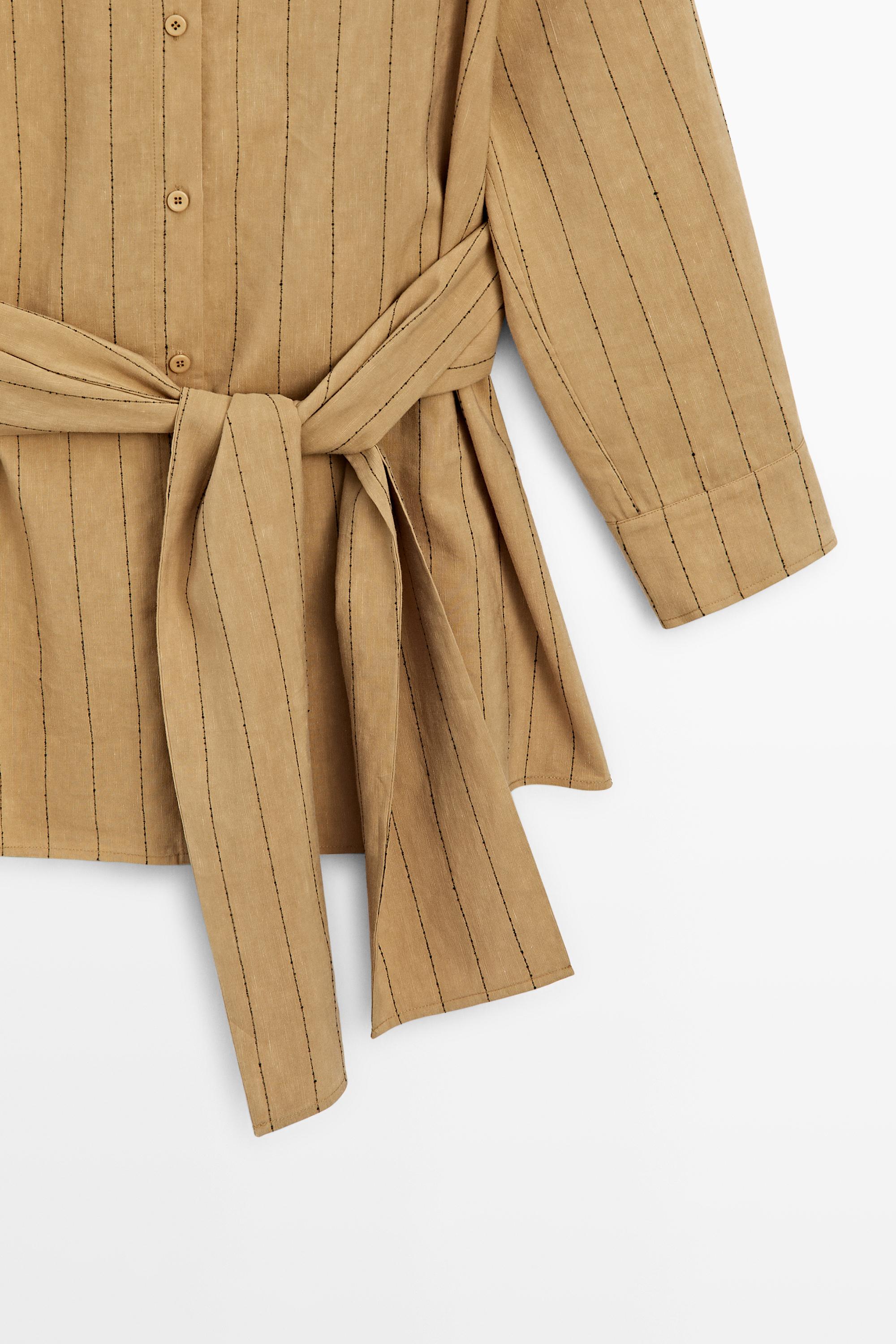 Striped flowing shirt with corset belt detail