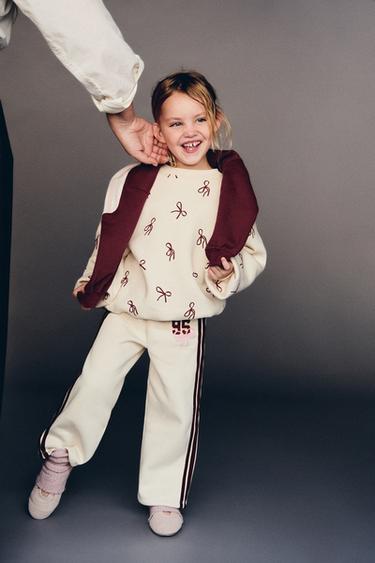 PANTALÓN WIDE LEG BANDAS LATERALES - Crudo de Zara