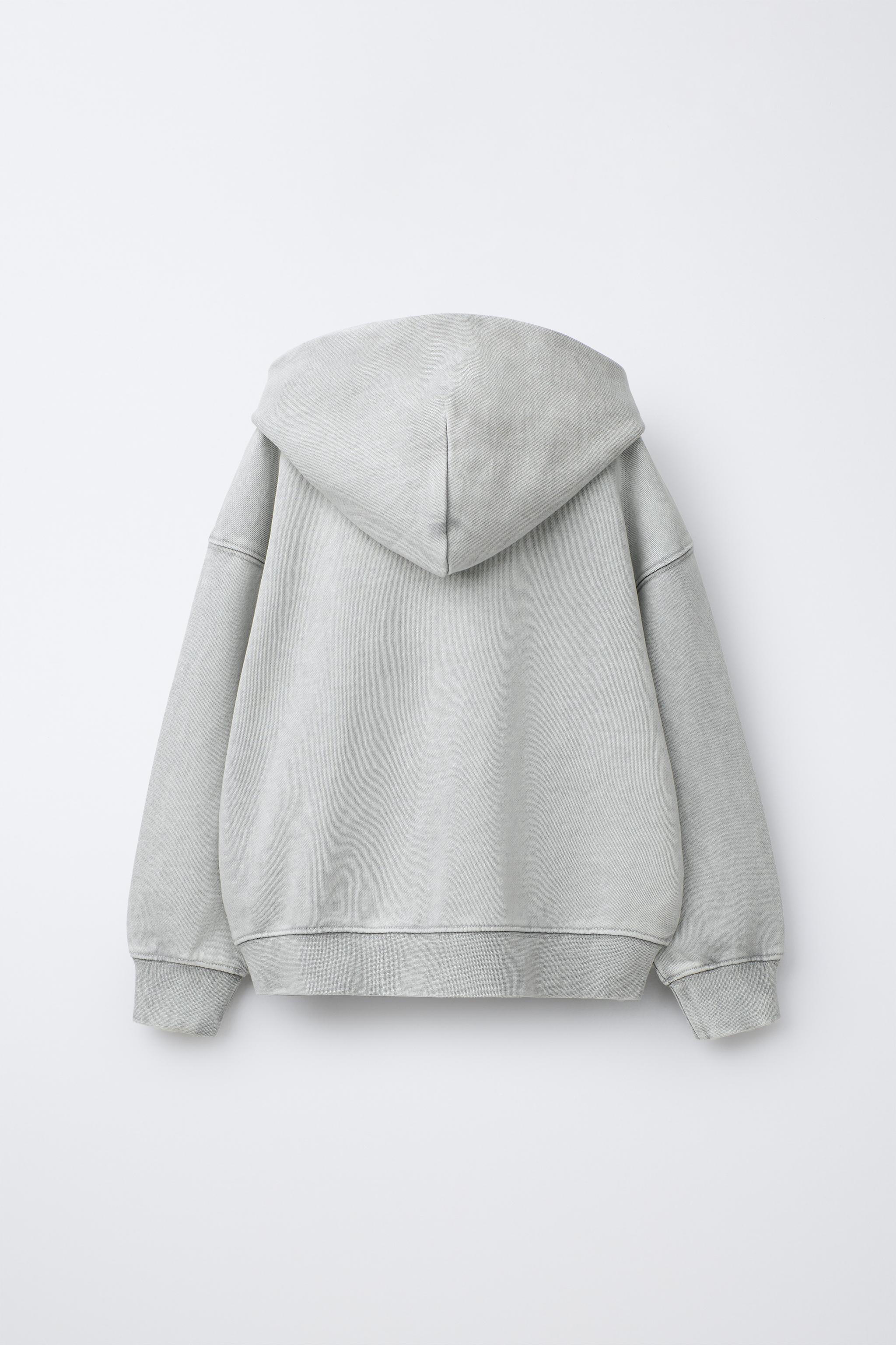 SWEAT ZIPPÉ À INSCRIPTION
