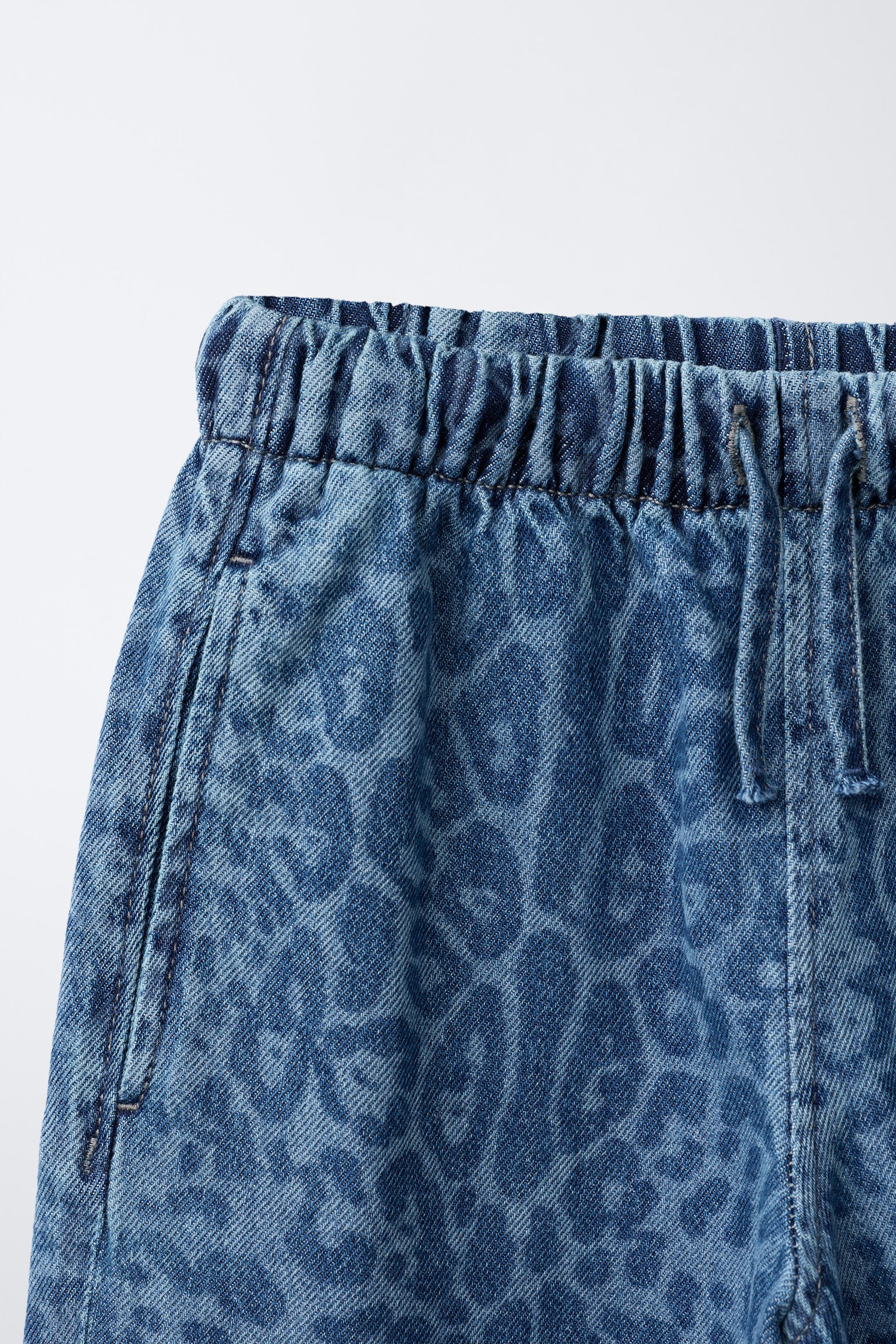 ANIMAL PRINT WIDE LEG JEANS