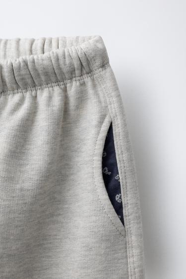 PANTALON MOLLETON À POCHES IMPRIMÉ - Gris chiné de Zara - Image 4