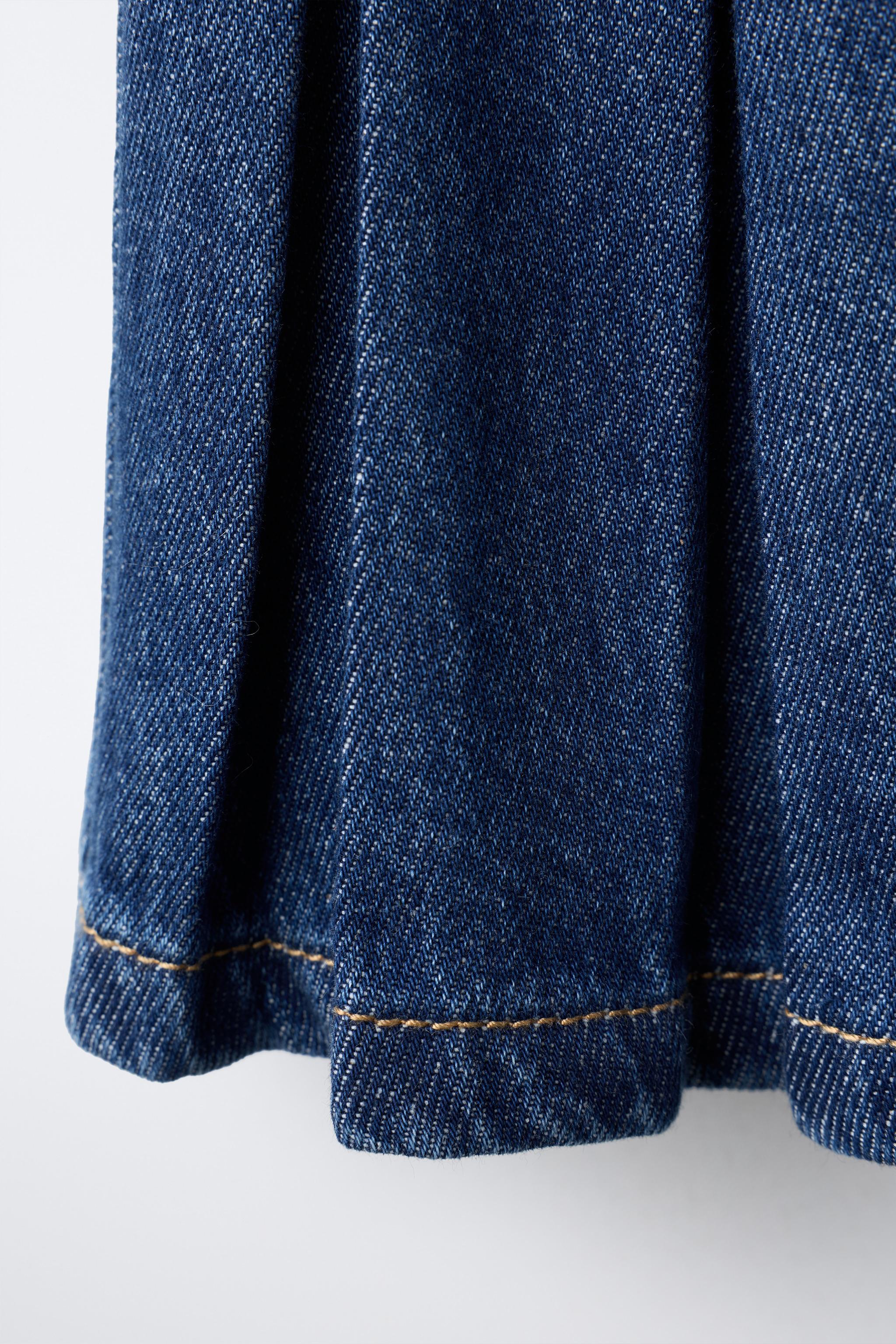PLEATED DENIM SKIRT
