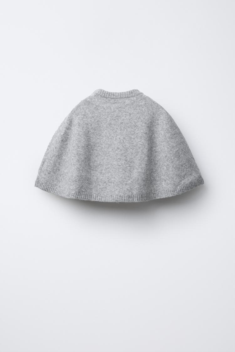 CAPE PONCHO WITH BOWS