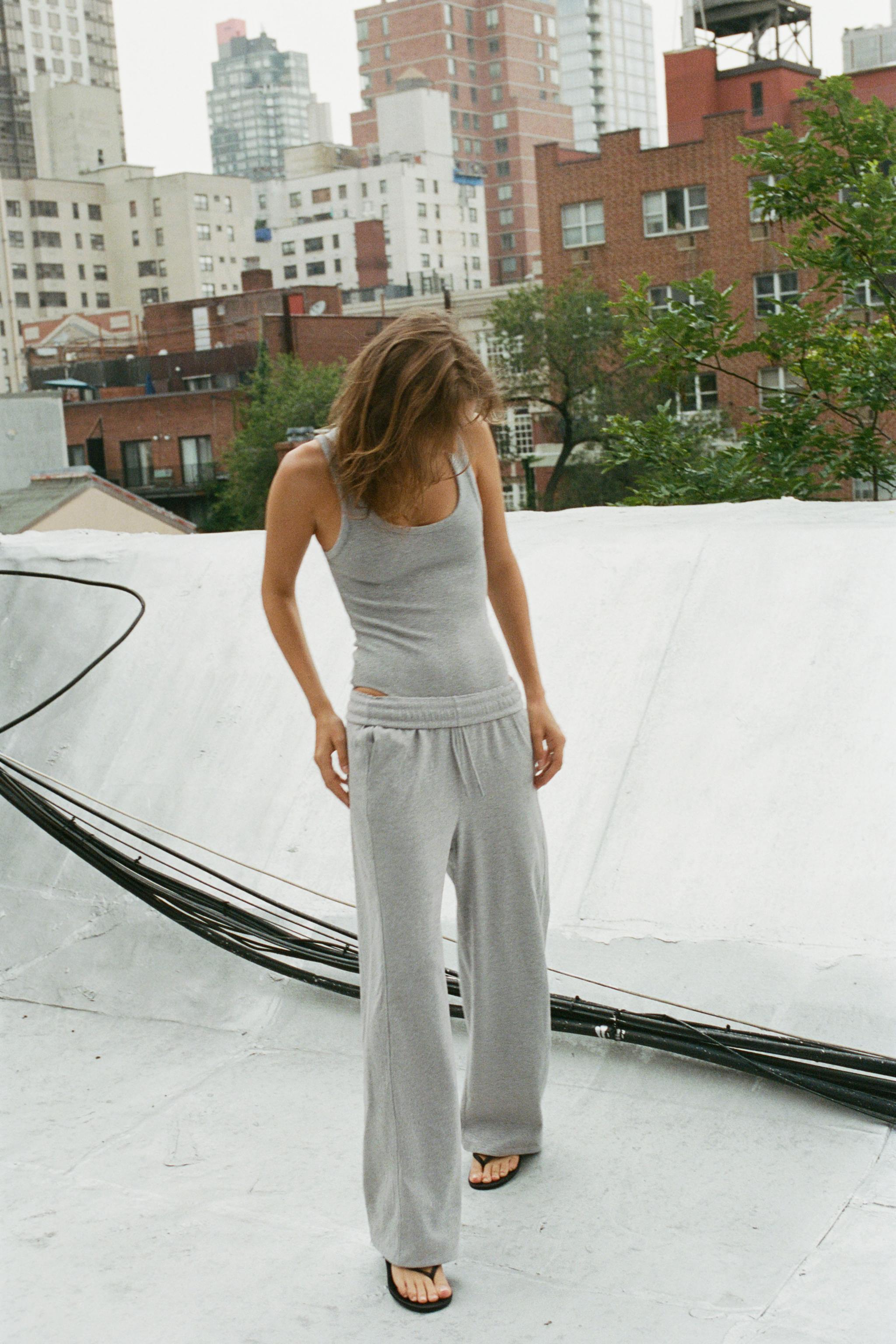 METALLIC THREAD TROUSERS WITH SLOGAN